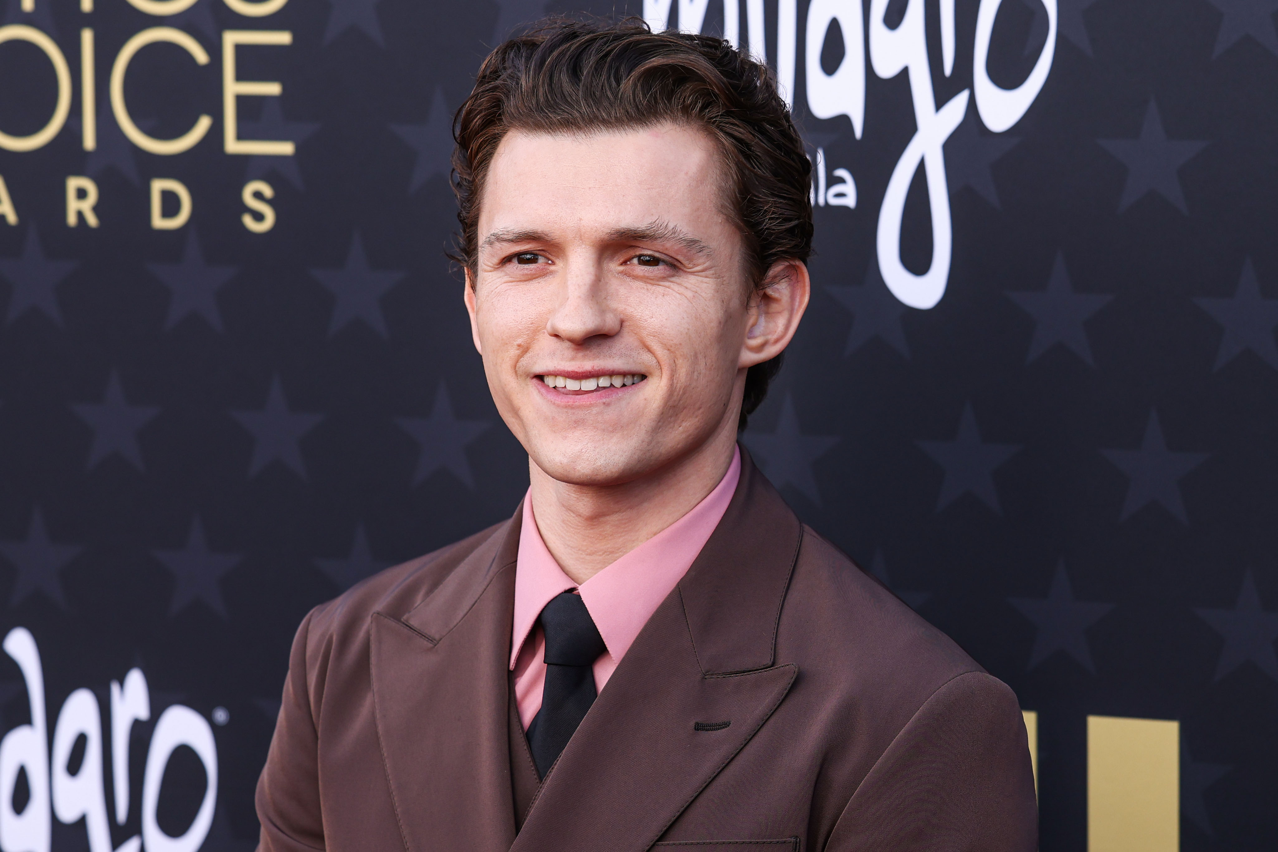 Tom Holland arrives at the Critics' Choice Awards.