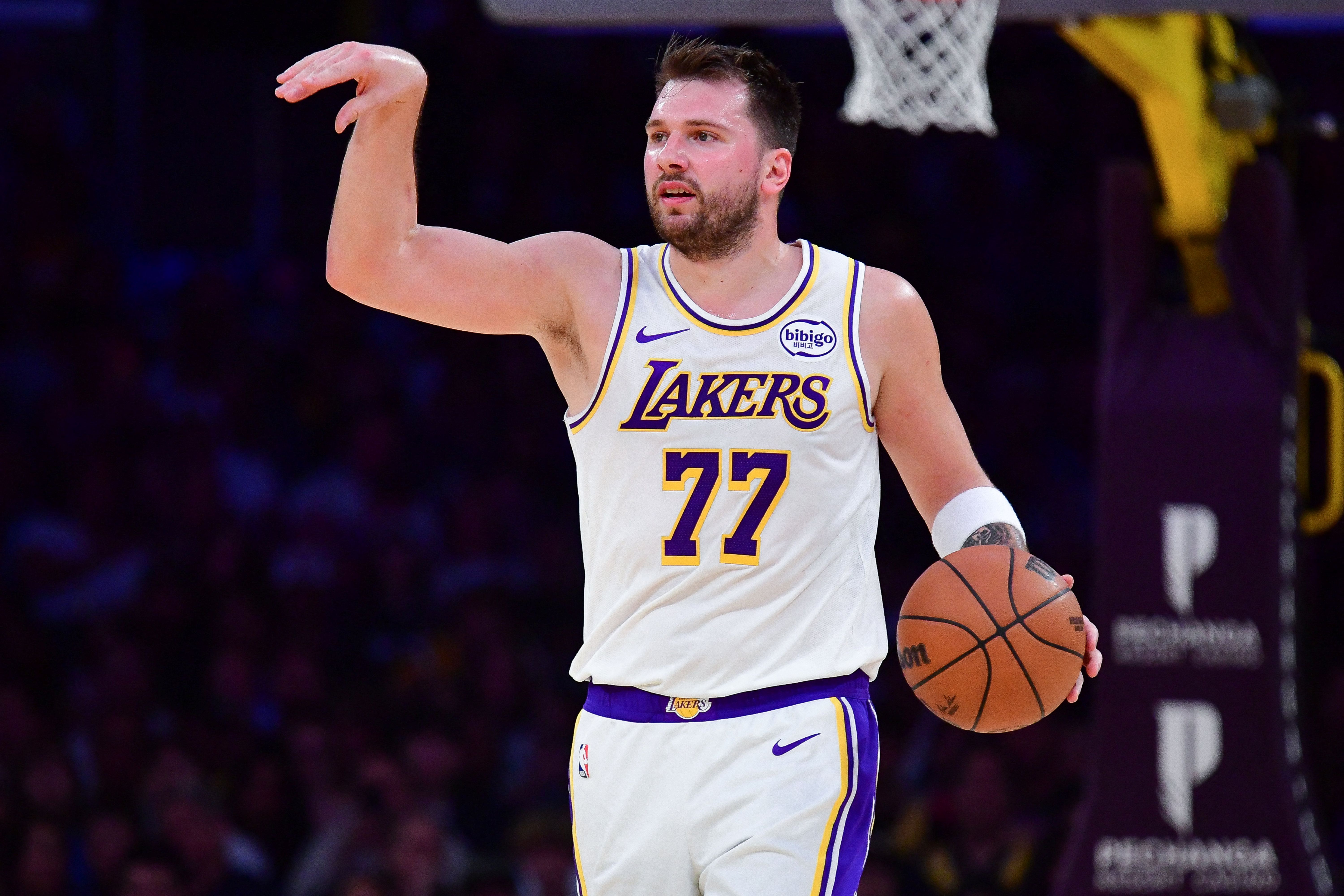 Los Angeles Lakers guard Luka Doncic moves the ball down court, and he's key as we look at our NBA player props today.