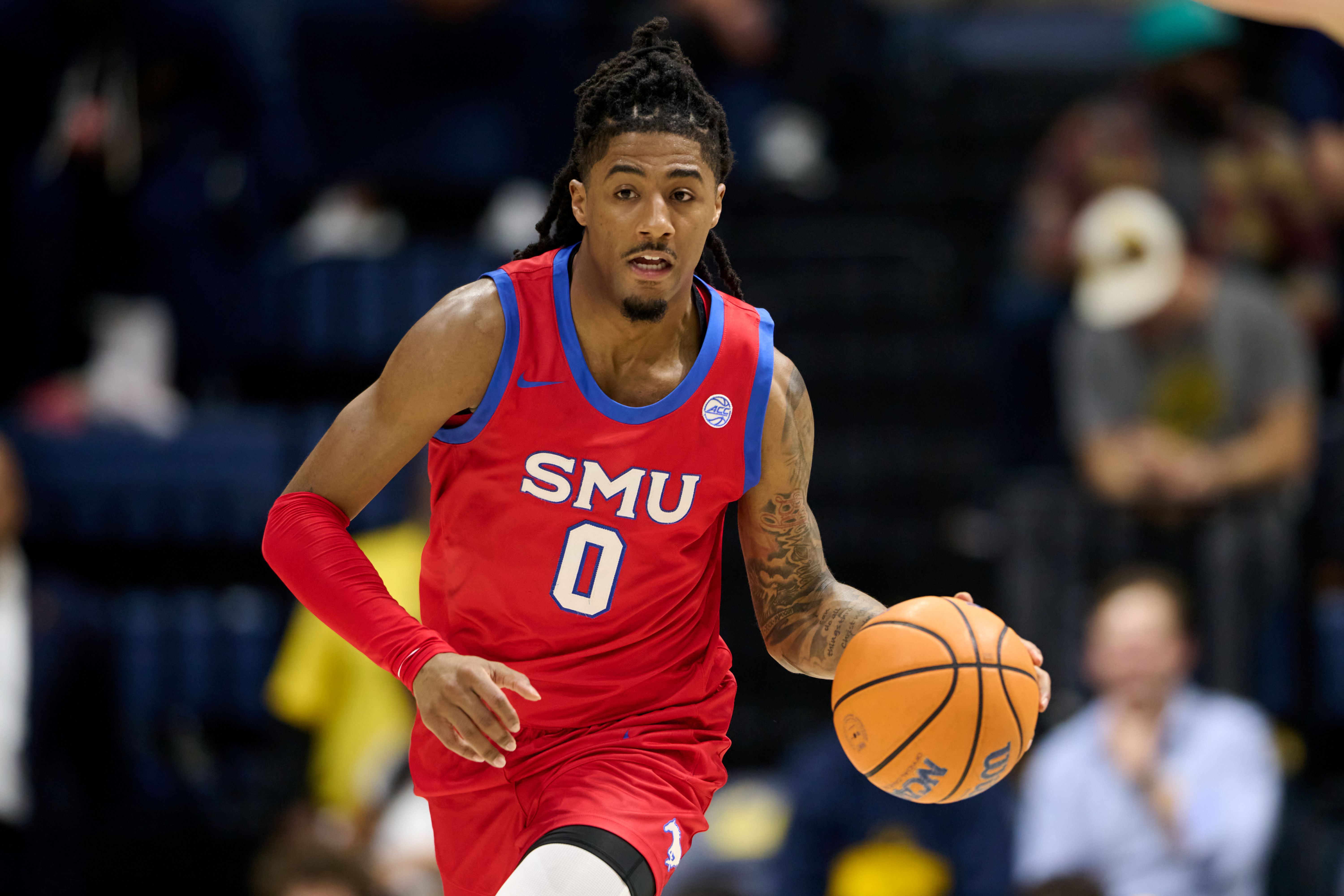 SMU Mustangs guard B.J. Edwards brings the ball upcourt as we make our best Miami (OH) vs. SMU First Four prediction.
