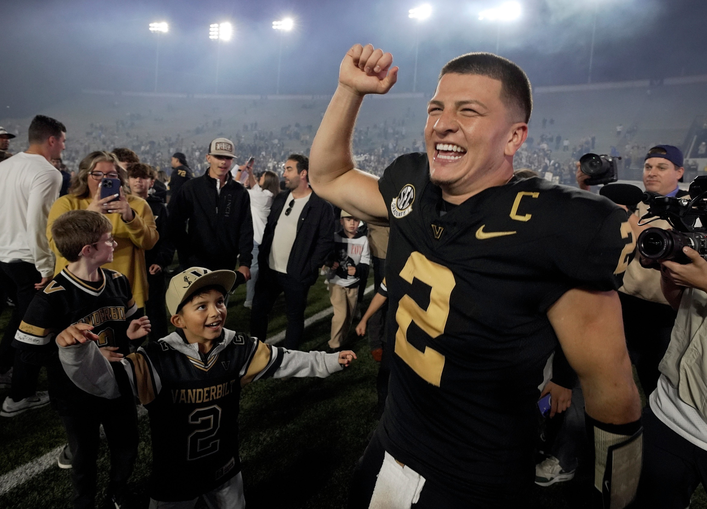 Vanderbilt quarterback Diego Pavia celebrates after the team's win as we look at our Iowa vs. Vanderbilt Predictions.