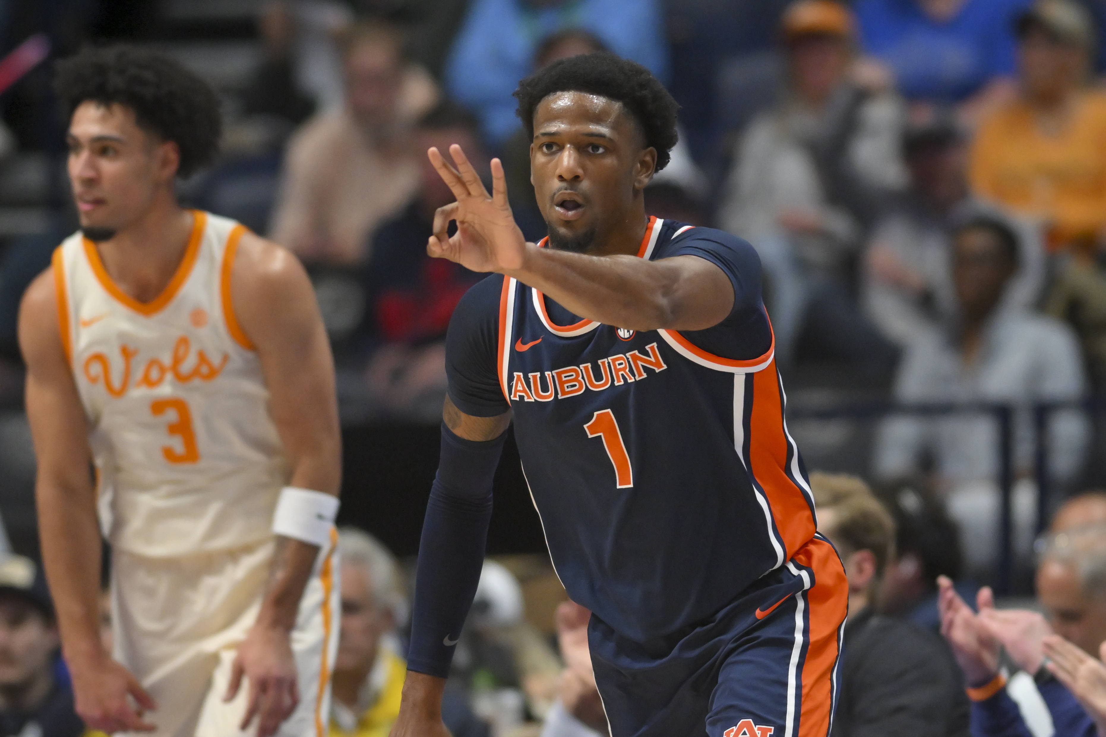 Auburn Tigers guard Kevin Overton (1), seen here reacting after a 3-pointer, is featured in our Nevada vs. Auburn prediction tonight.