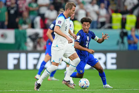 England forward Harry Kane dribbles the ball against United States of America midfielder Tyler Adams as we predict the outcome and provide best bets for Serbia vs. England at Euro 2024. 