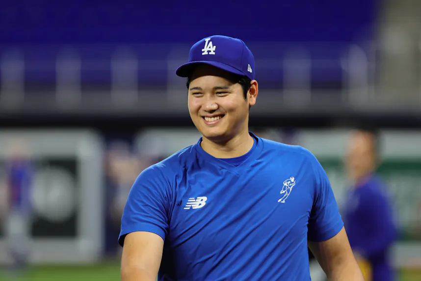 Los Angeles Dodgers designated hitter Shohei Ohtani reacts on the field before the game against the Miami Marlins.