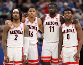 Caleb Love, Keshad Johnson, Oumar Ballo, and Jaden Bradley of the Arizona Wildcats look on as Pelle Larsson shoots free throws against the Dayton Flyers, and we offer our top Clemson vs. Arizona player props based on the best NCAAB odds.