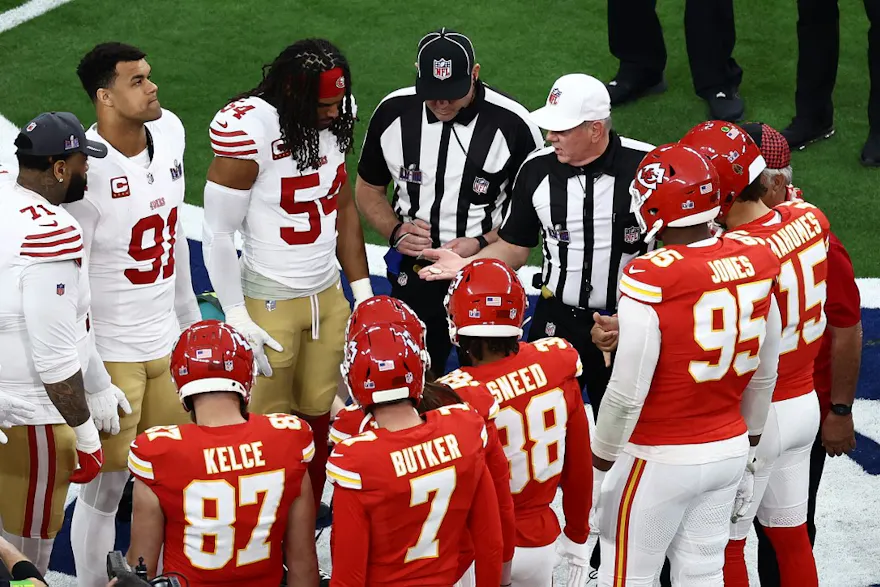Captains for the Kansas City Chiefs and San Francisco 49ers lineup for the coin toss prior to Super Bowl LVIII at Allegiant Stadium as we look at the odds and history of the Super Bowl coin toss.