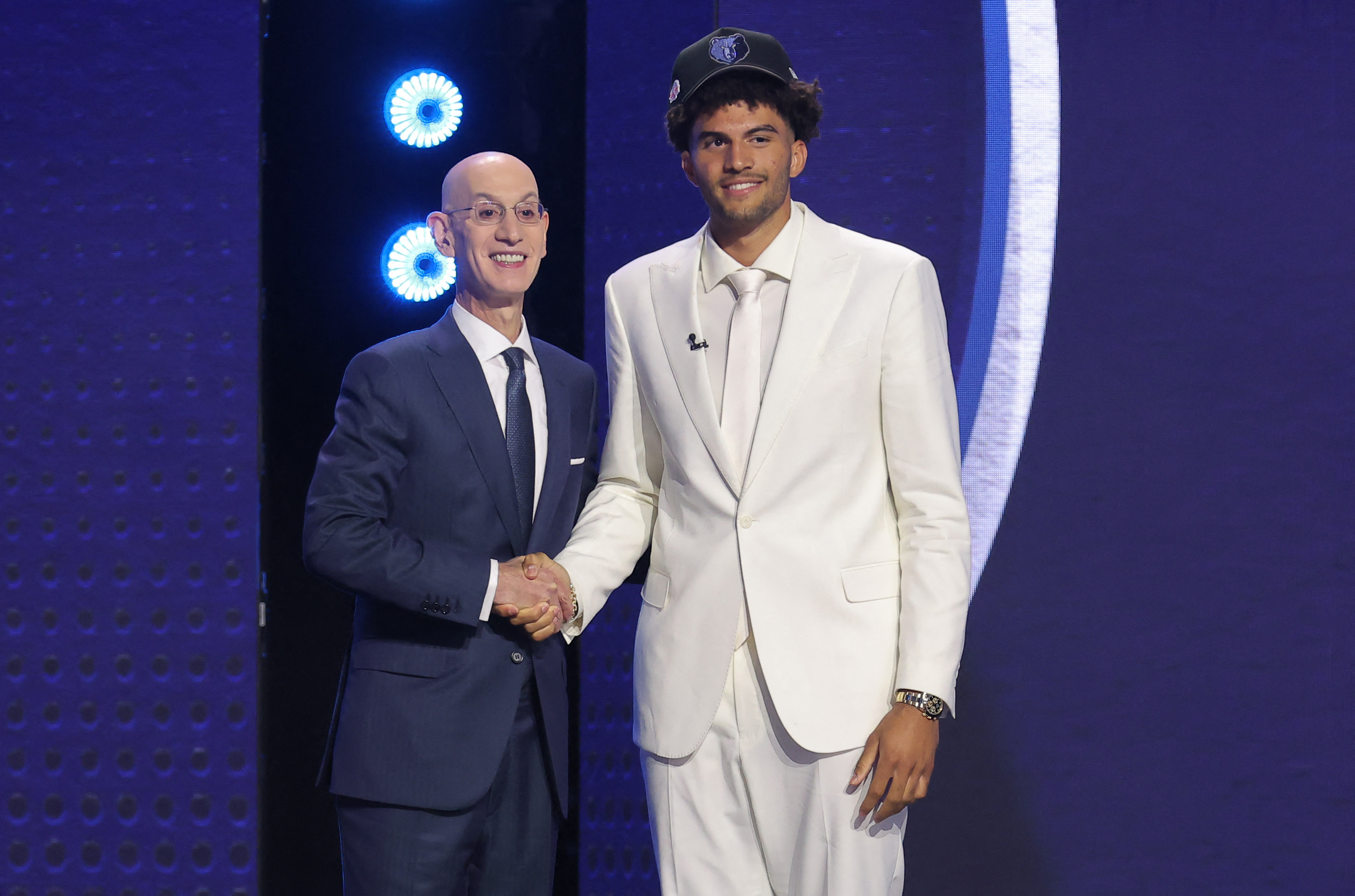 Cameron Boozer (right) opened as the NBA Rookie of the Year odds favorite after being selected No. 3 by the Memphis Grizzlies. 