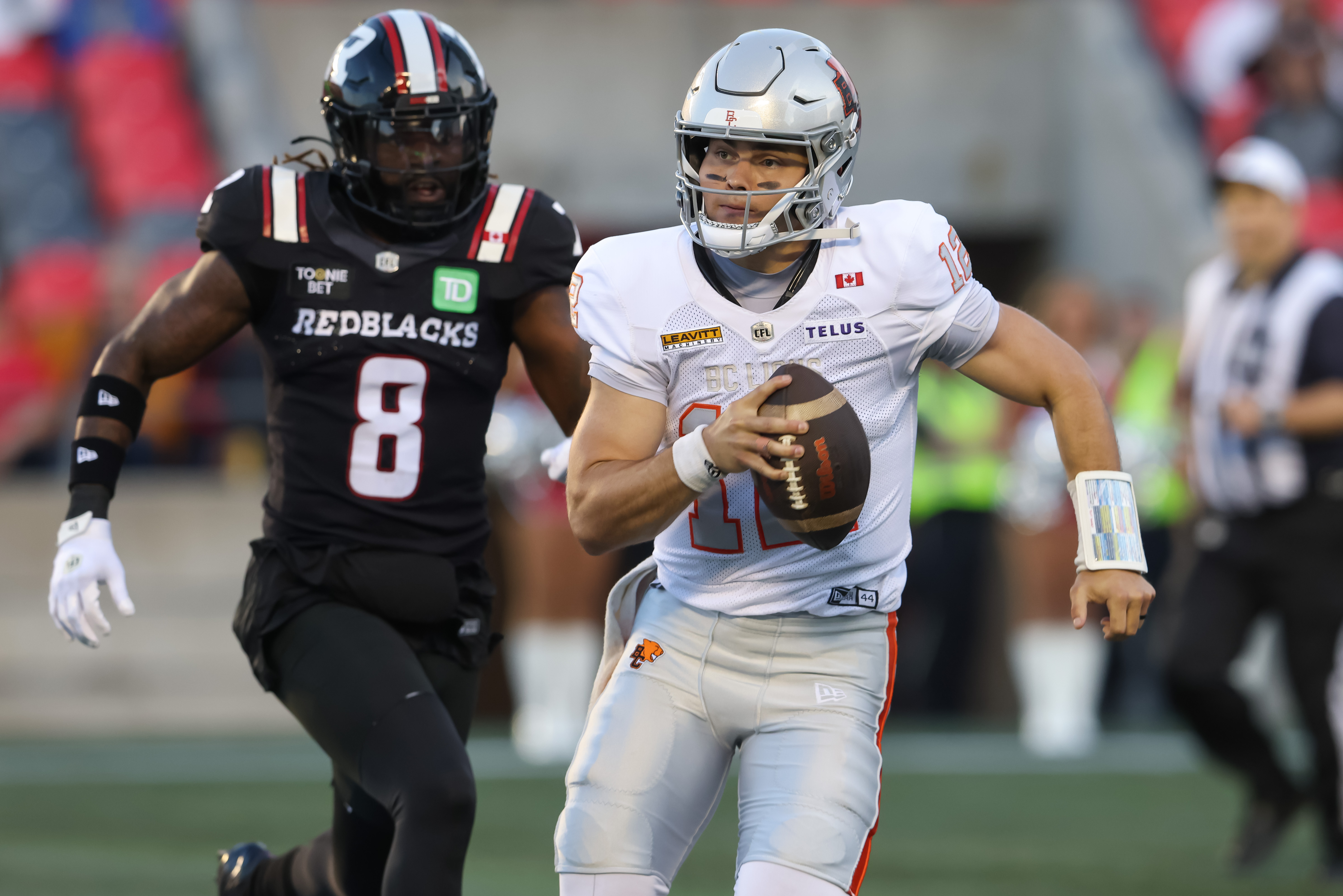BC Lions quarterback Nathan Rourke (12) runs as we break down our Lions vs. Alouettes prediction.