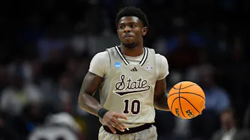 Dashawn Davis of the Mississippi State Bulldogs dribbles against the Michigan State Spartans during the first half in the first round of the NCAA Men's Basketball Tournament at Spectrum Center as we look at Mississippi State and mobile sports betting.