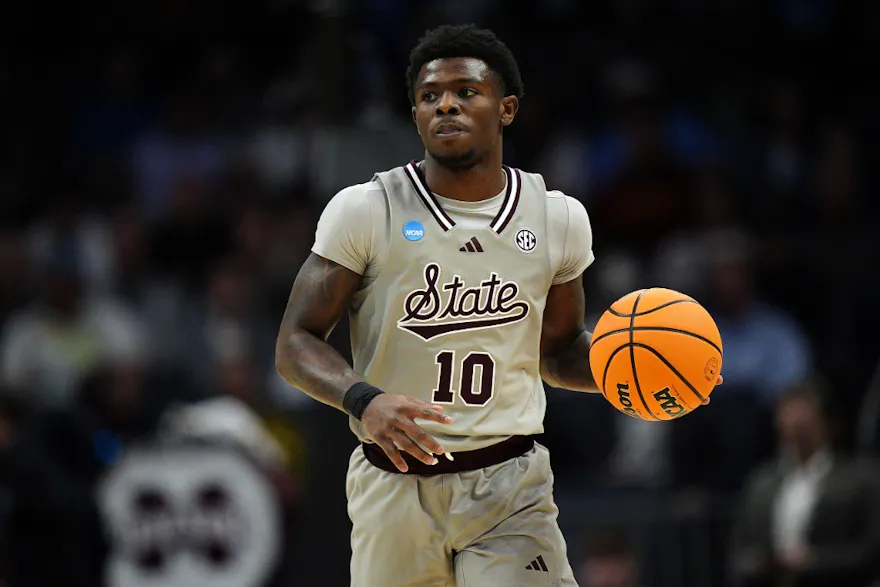 Dashawn Davis of the Mississippi State Bulldogs dribbles against the Michigan State Spartans during the first half in the first round of the NCAA Men's Basketball Tournament at Spectrum Center as we look at Mississippi State and mobile sports betting.