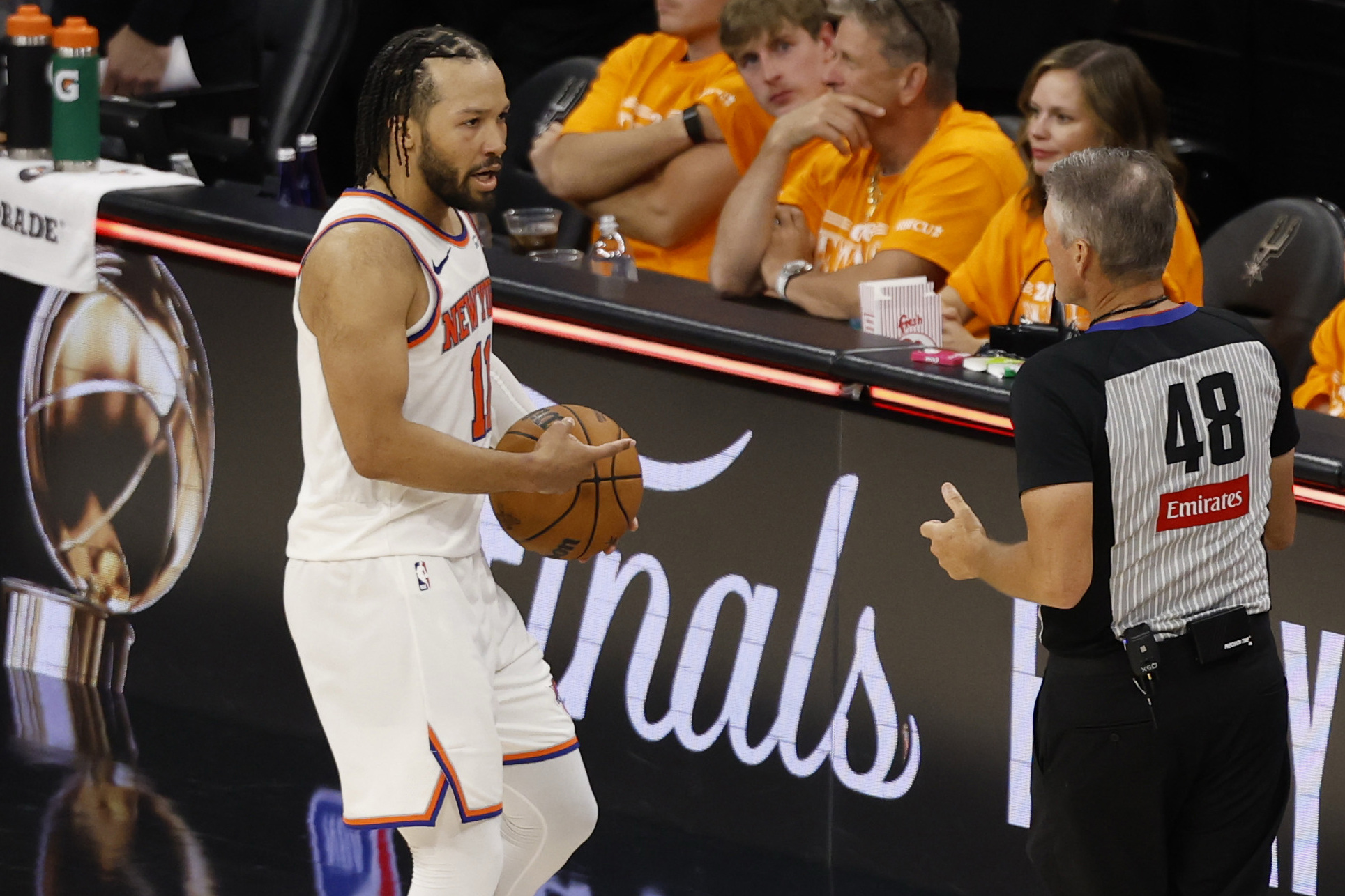 New York Knicks guard Jalen Brunson (11) argues with referee Scott Foster as we break down our Knicks vs. Spurs prediction.