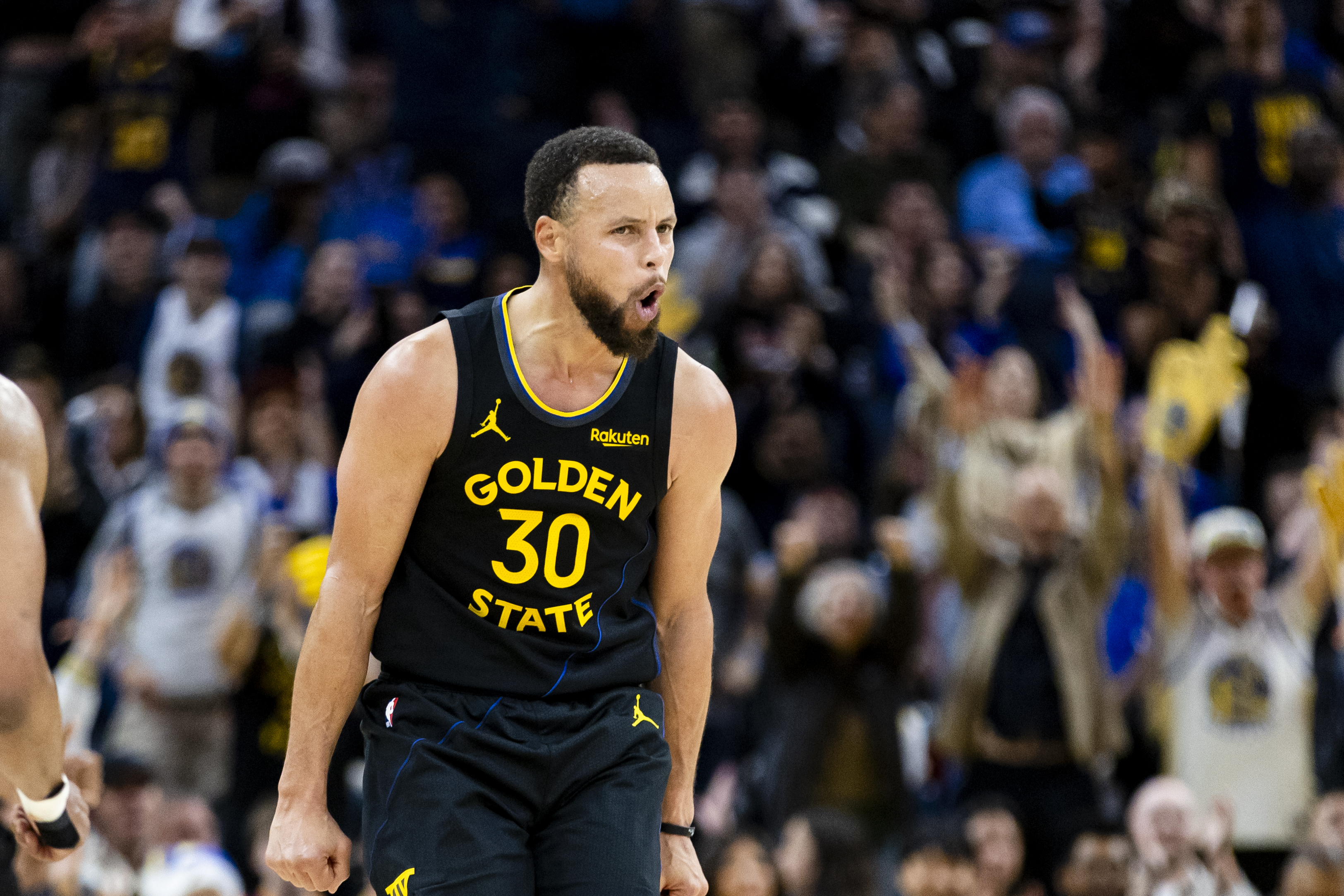 Golden State Warriors guard Stephen Curry (30) reacts as we offer our Mavericks vs. Warriors same-game parlay.
