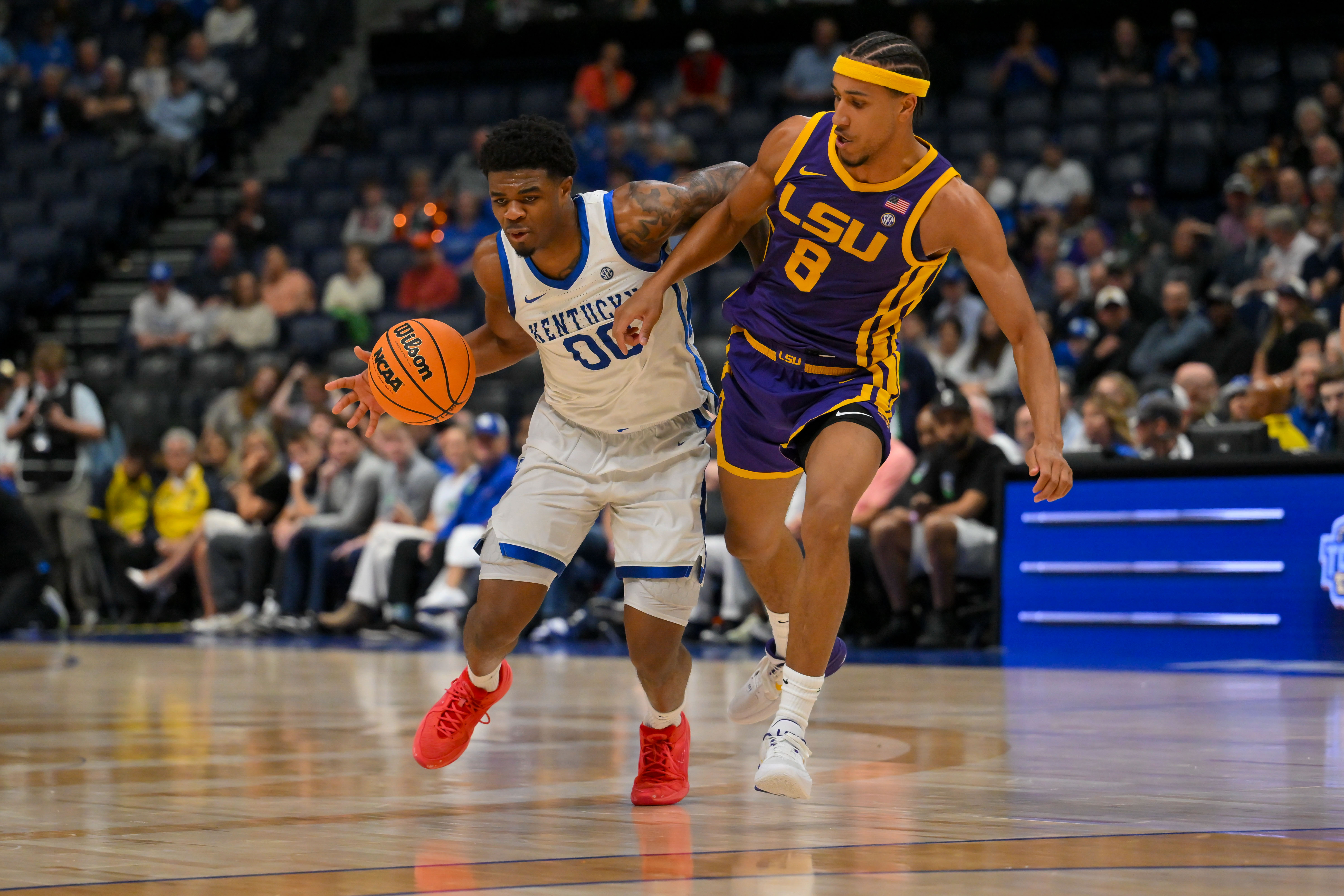 Guard Otega Oweh dribbles as we offer our Kentucky vs. Iowa State prediction and parlay today.