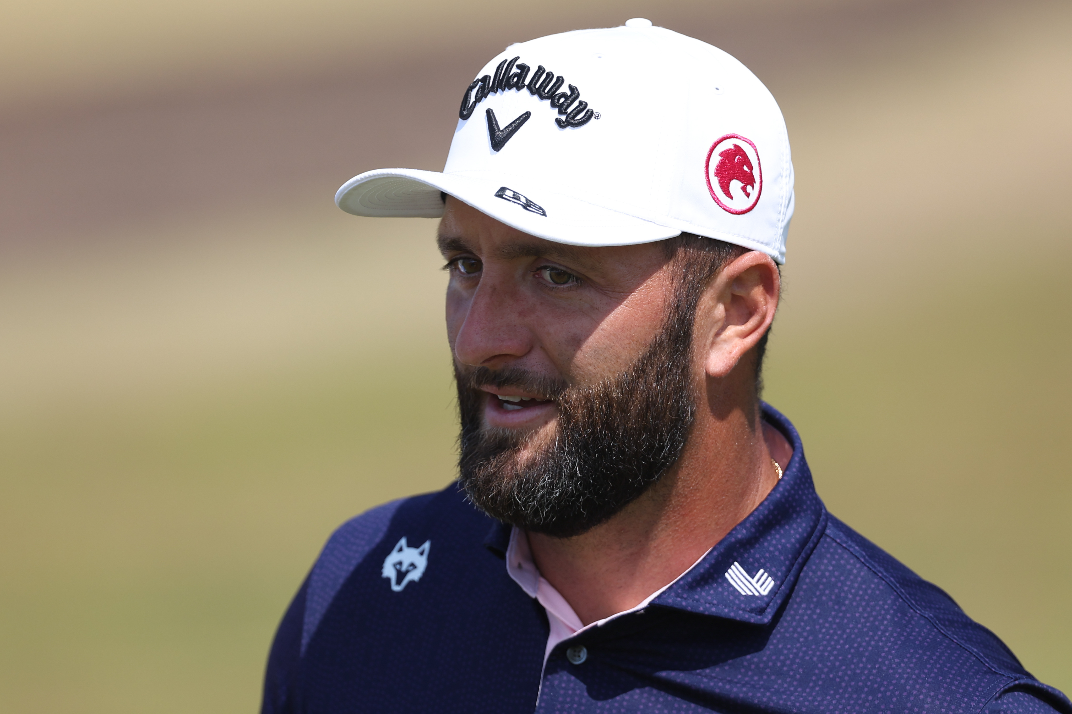 Jon Rahm during a practice round as he is featured in our British Open cheat sheet & expert picks.