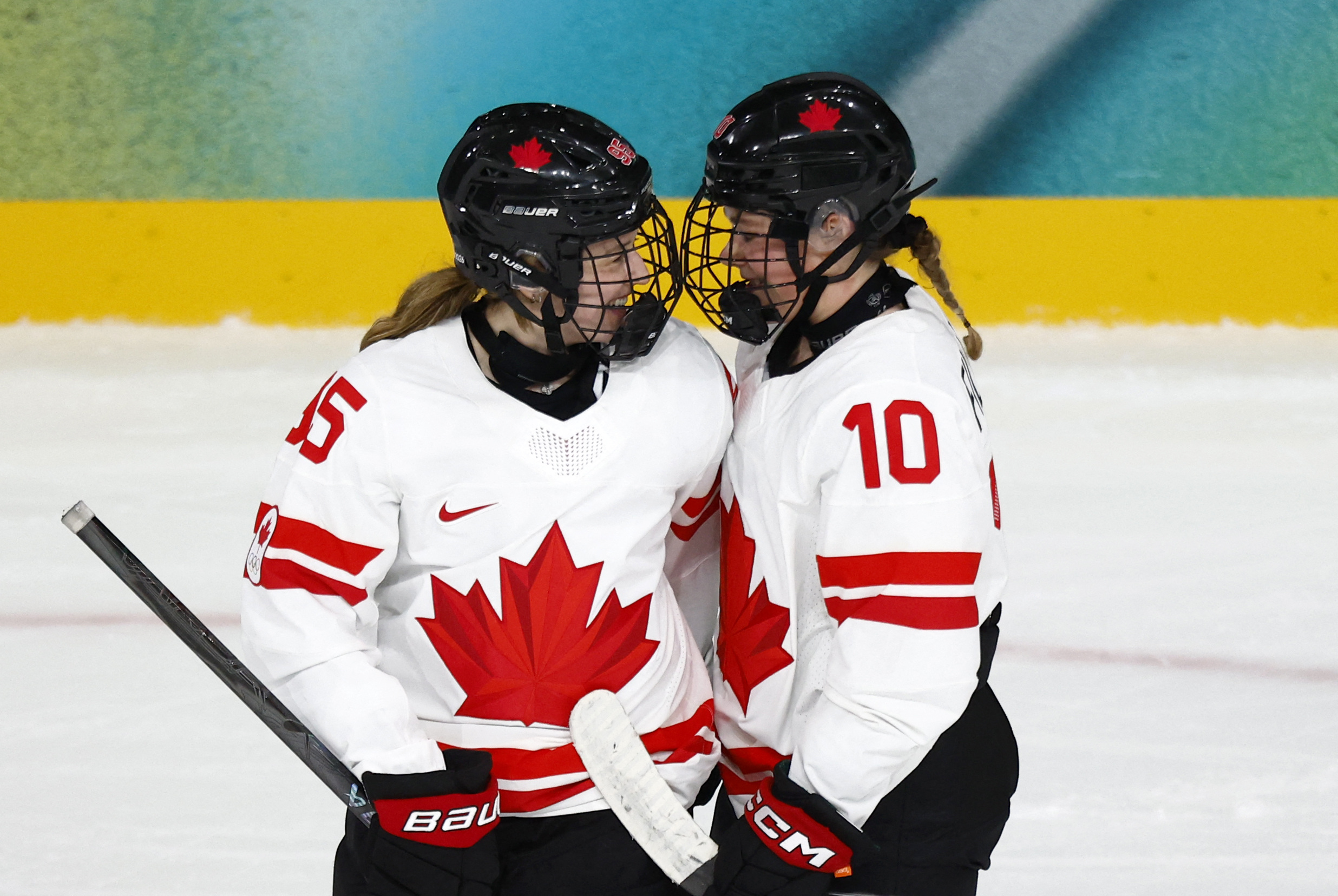 Daryl Watts and Sarah Fillier celebrate a goal as we offer our Canada vs. Finland prediction and expert picks. 