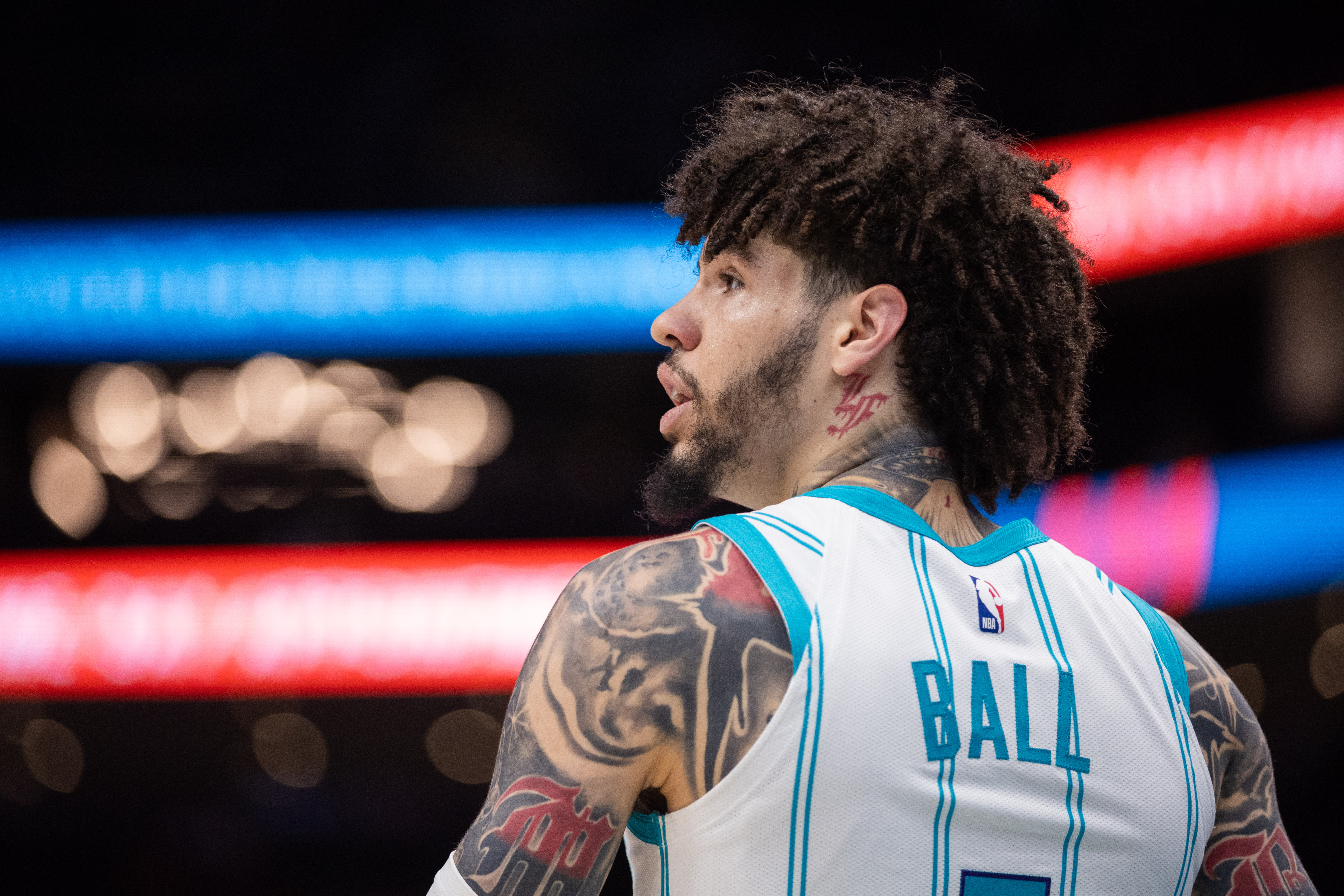 Charlotte Hornets guard LaMelo Ball (1), seen here looking back during a game, is featured in our Hornets vs. Magic prediction today.