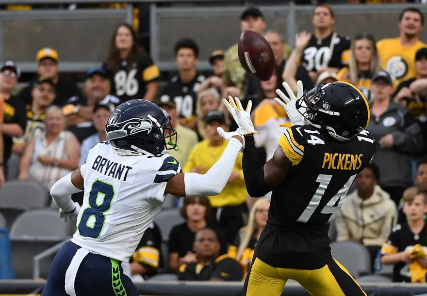 George Pickens of the Pittsburgh Steelers makes a catch for a 26-yard touchdown reception as Coby Bryant of the Seattle Seahawks defends him