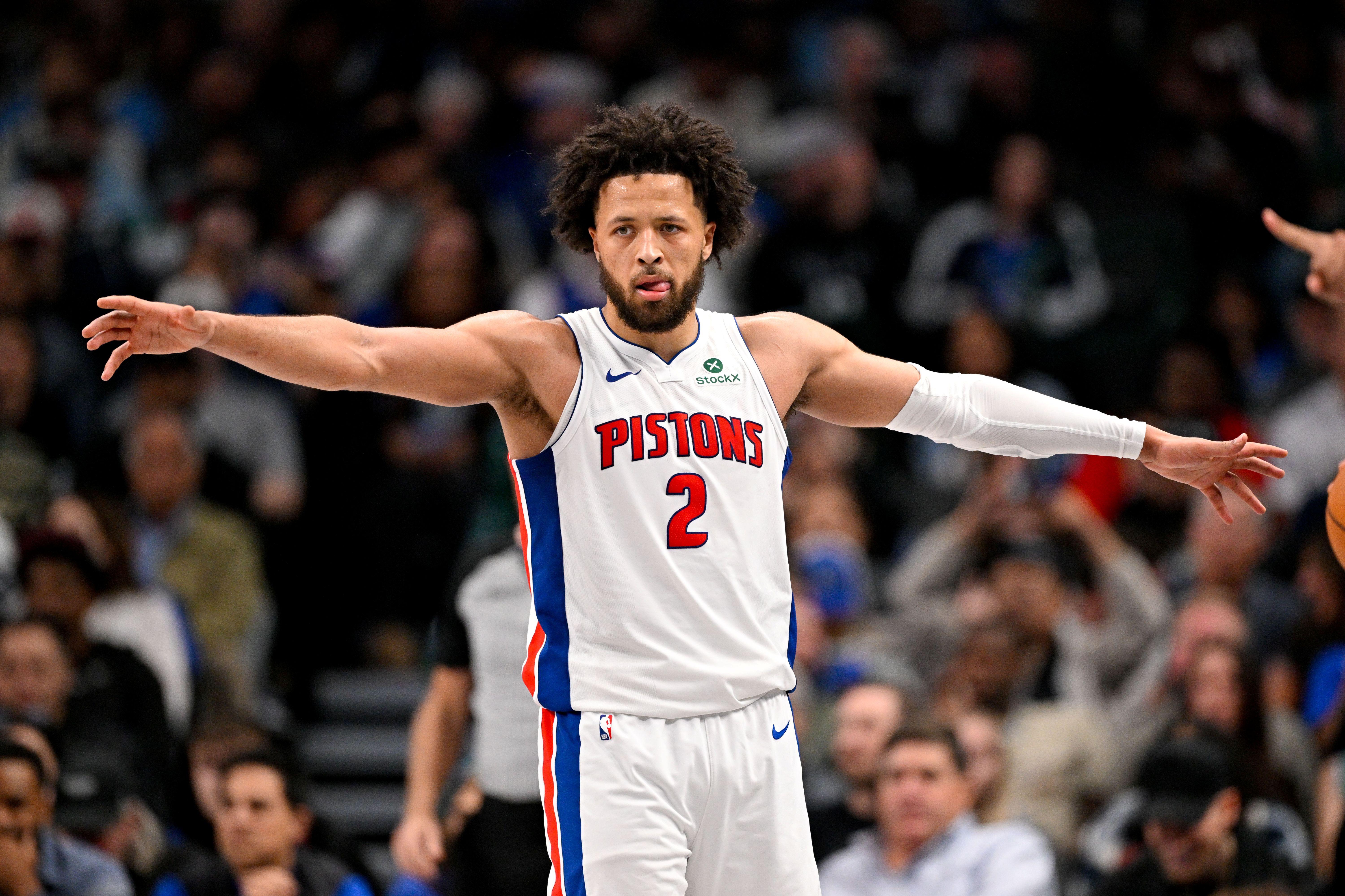 Detroit Pistons guard Cade Cunningham (2), seen here looking on during a game, is featured in our NBA awards eligibility tracker 2026.