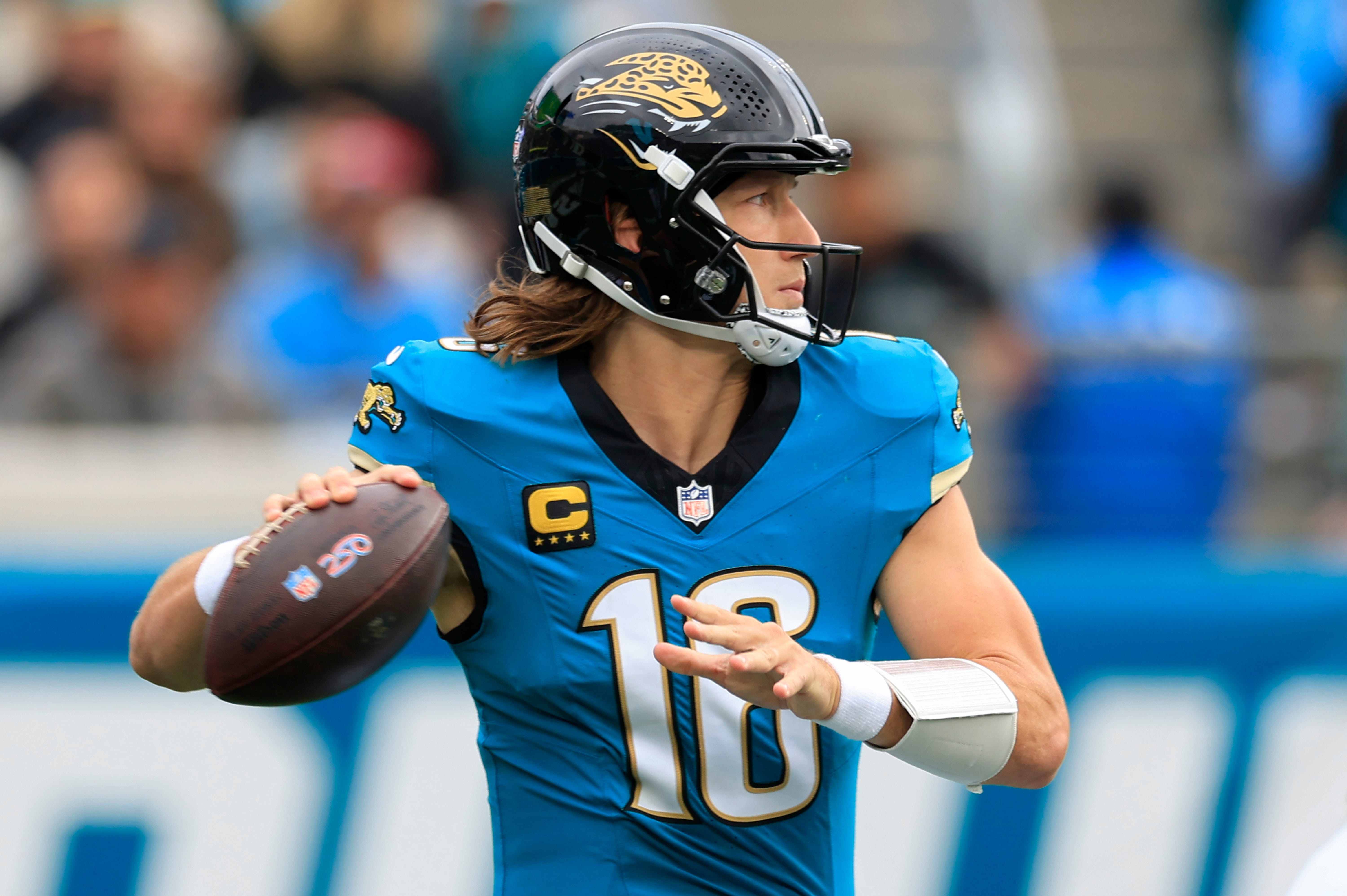 Jacksonville Jaguars quarterback Trevor Lawrence - who's featured in my Bills vs. Jaguars prediction - looks to pass.