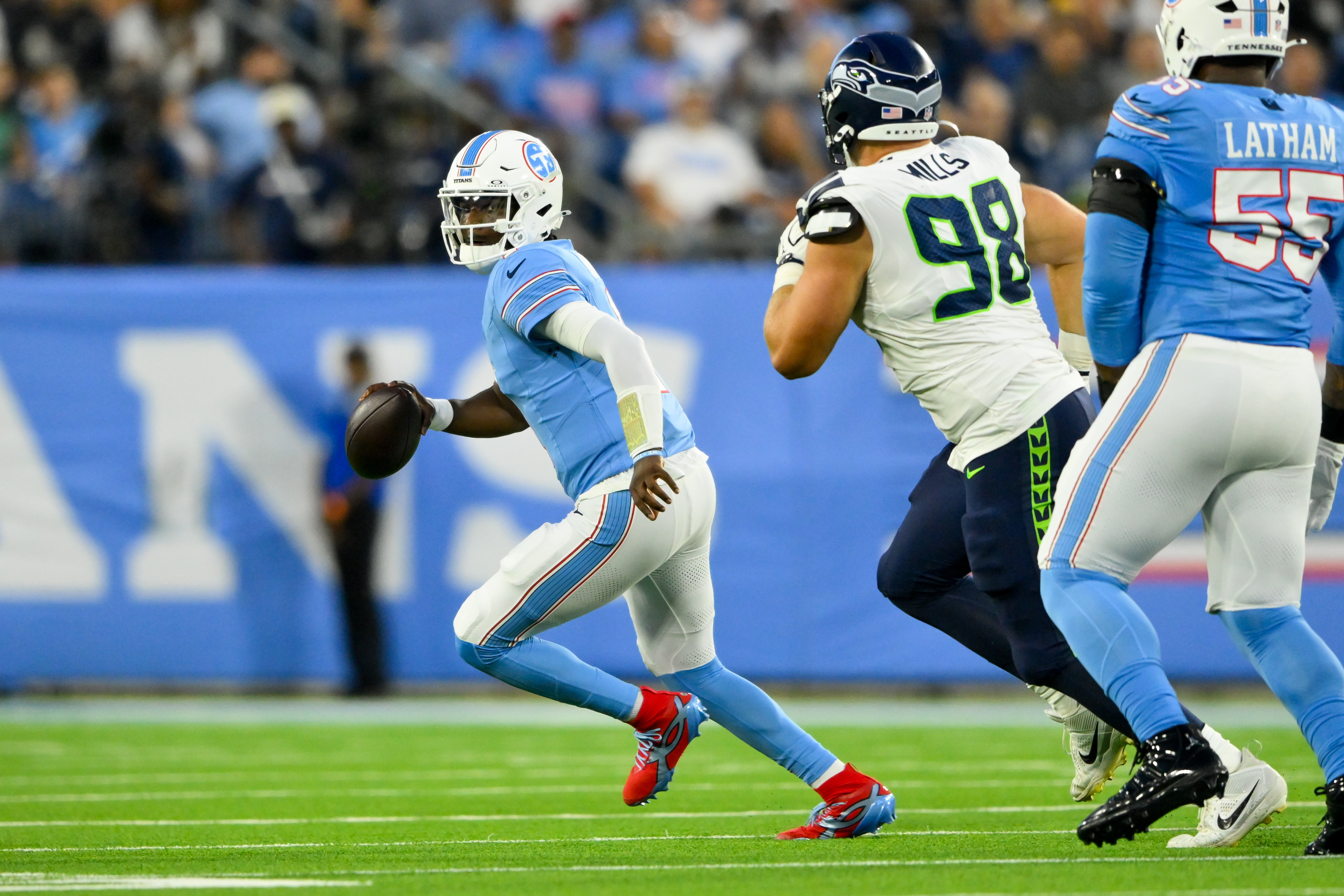Tennessee quarterback Cam Ward in action as we break down our Jets vs. Titans Prediction. Photo by Steve Roberts-Imagn Images.