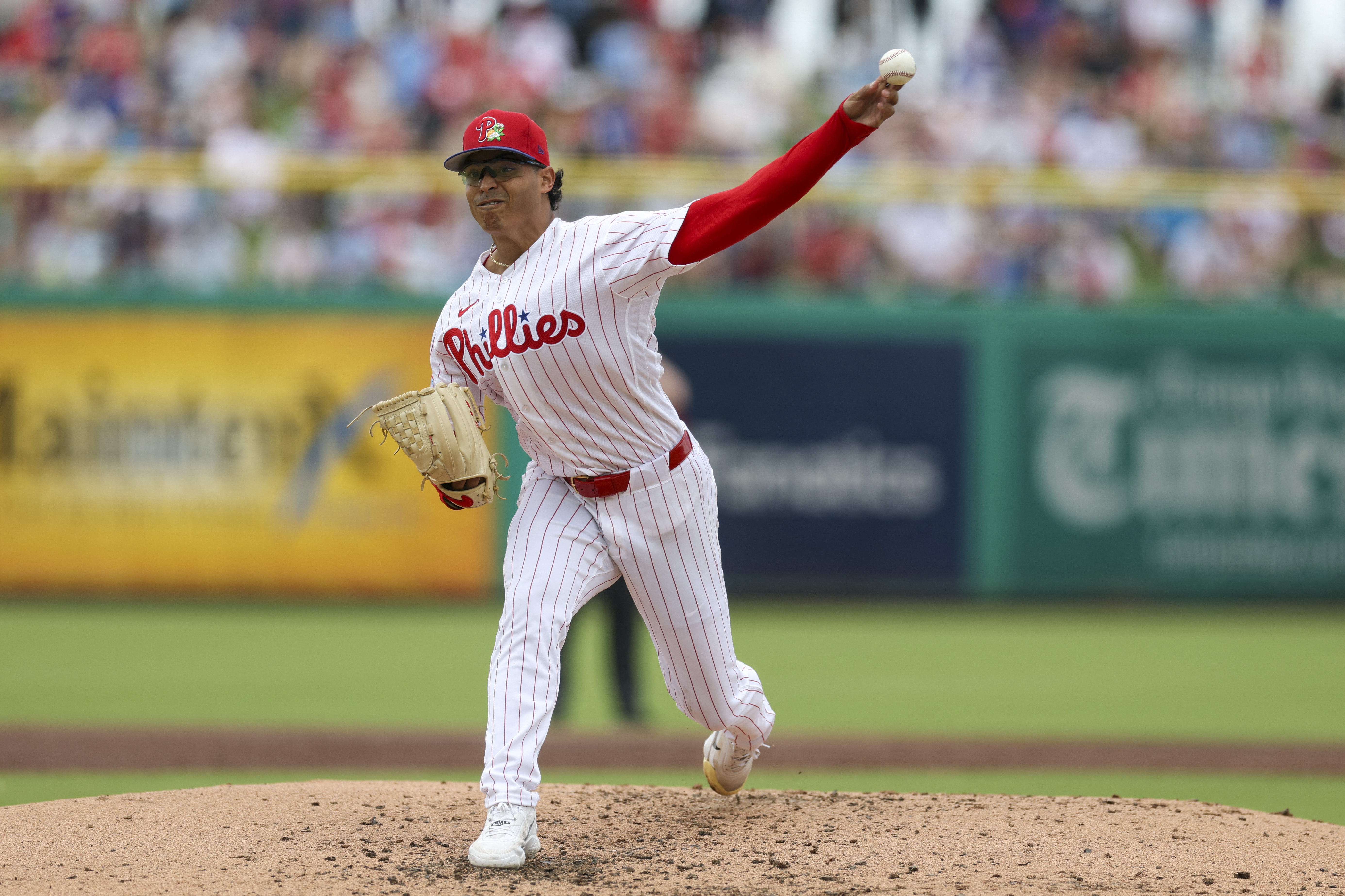 Philadelphia Phillies starting pitcher Jesus Luzardo (44) throws a pitch as we break down our Cubs vs Phillies prediction.