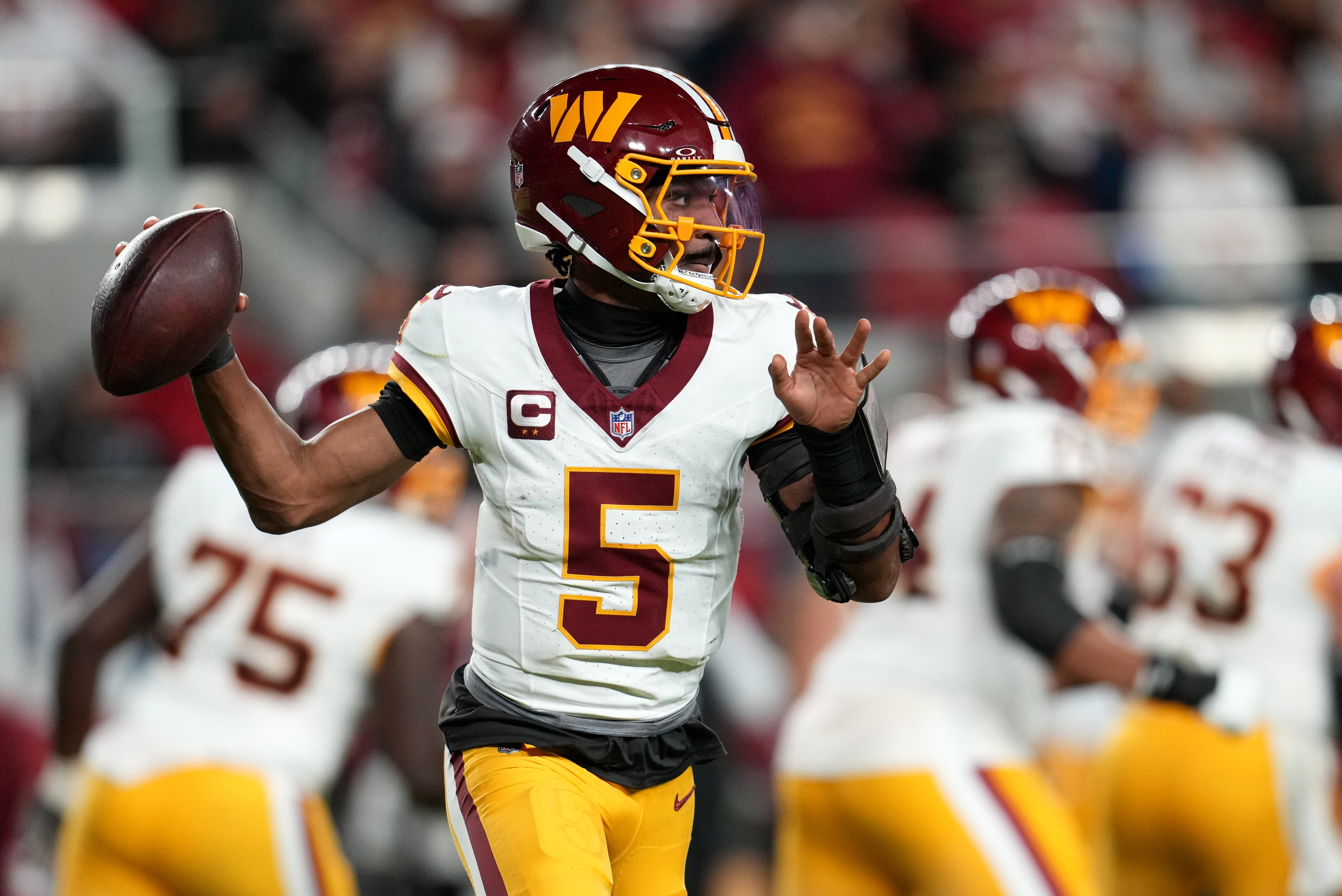 Pictured: Jayden Daniels throwing a pass as we break down our Eagles vs. Commanders Prediction. Photo by  Cary Edmondson-Imagn Images.