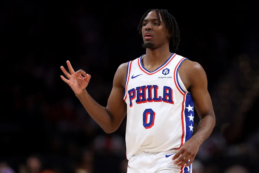 Tyrese Maxey of the Philadelphia 76ers celebrates after scoring a 3-pointer against the Washington Wizards during the second half at Capital One Arena as we look at our 76ers Celtics BetRivers promo code.