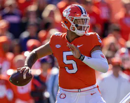 Quarterback D.J. Uiagalelei of the Clemson Tigers looks to pass against the Wake Forest Demon Deacons.