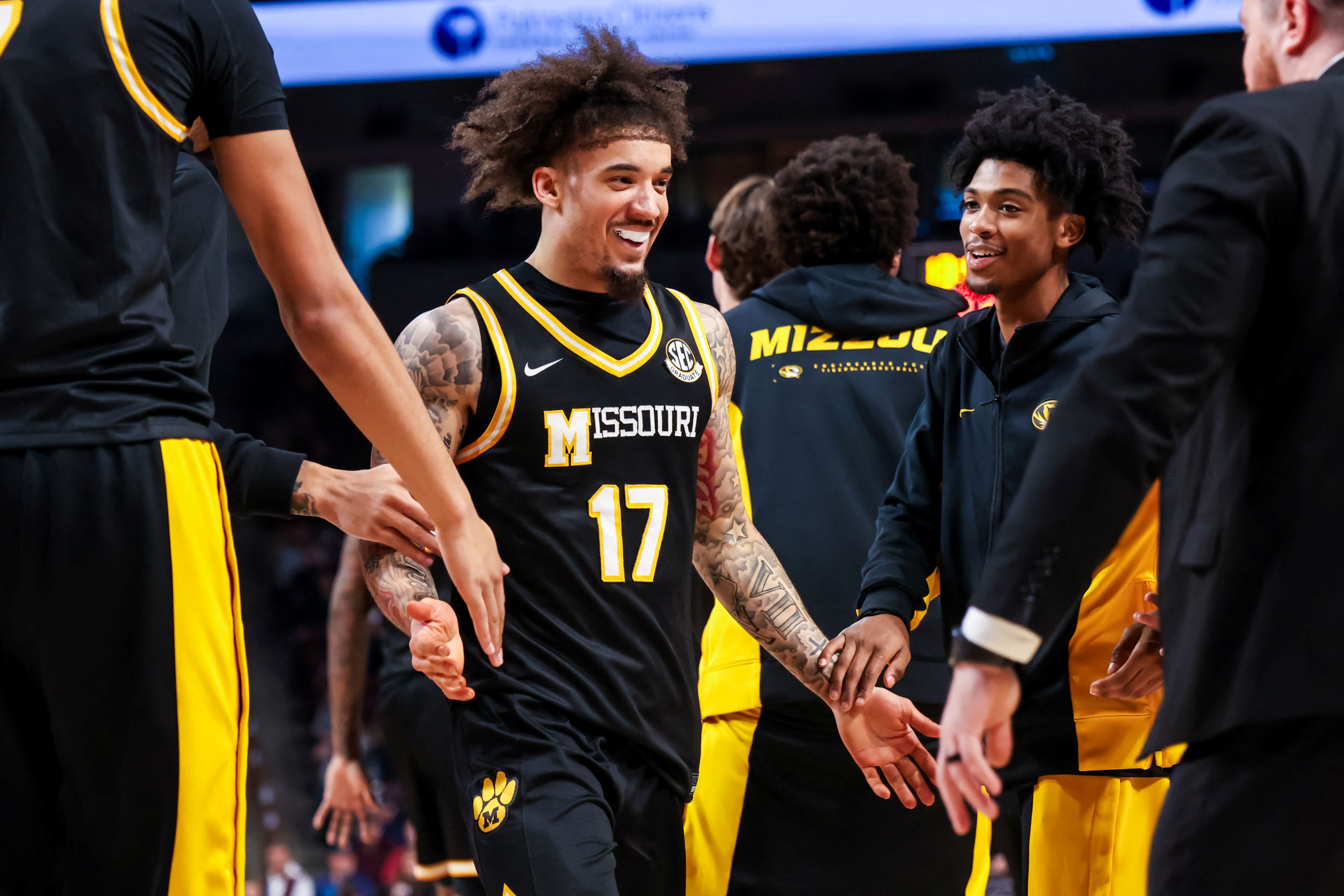 Missouri Tigers guard Jayden Stone celebrates, and he's key as we look at our Arkansas vs. Missouri prediction.