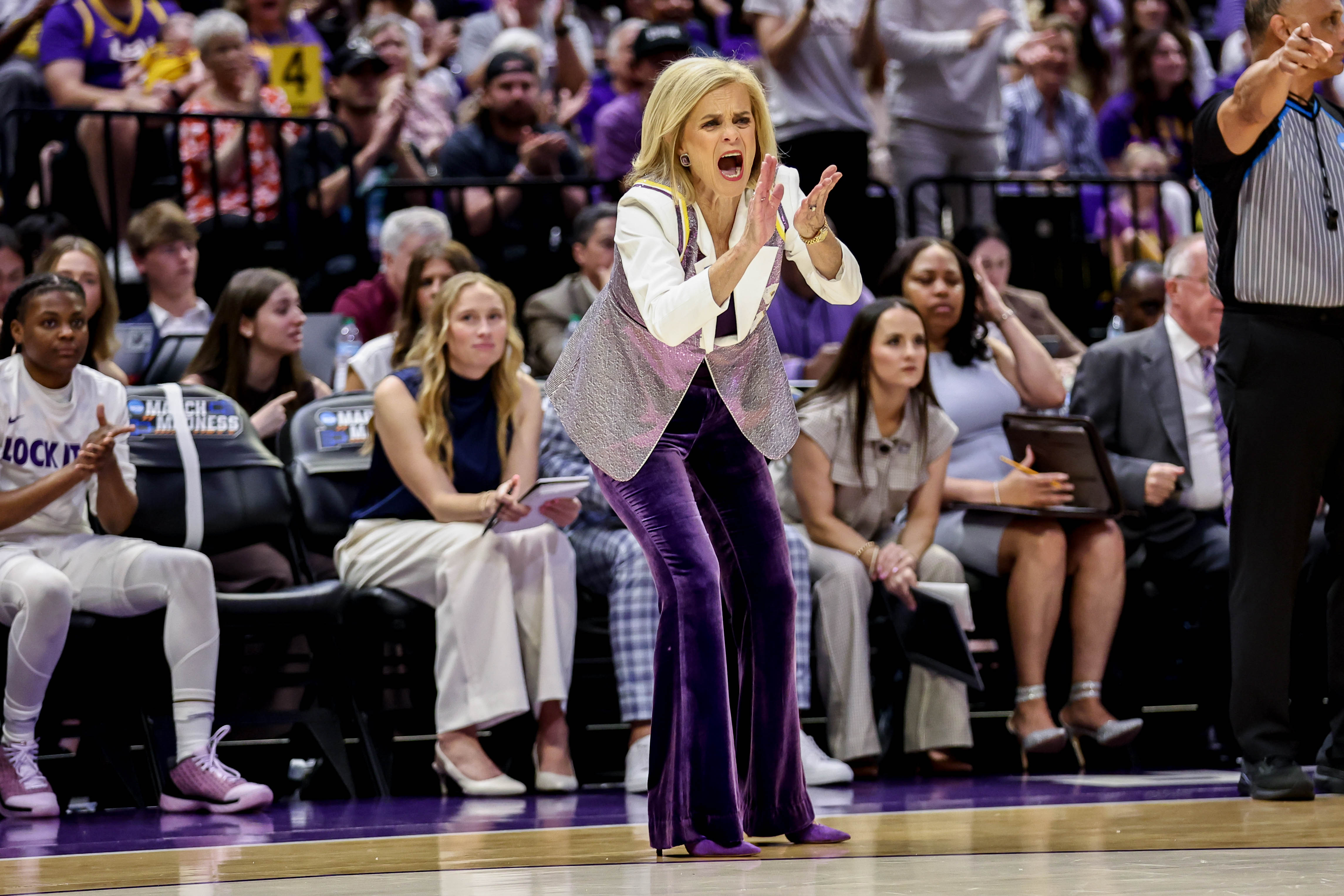 LSU Head Coach Kim Mulkey celebrates a big shot as we break down our Duke vs. LSU prediction & picks.