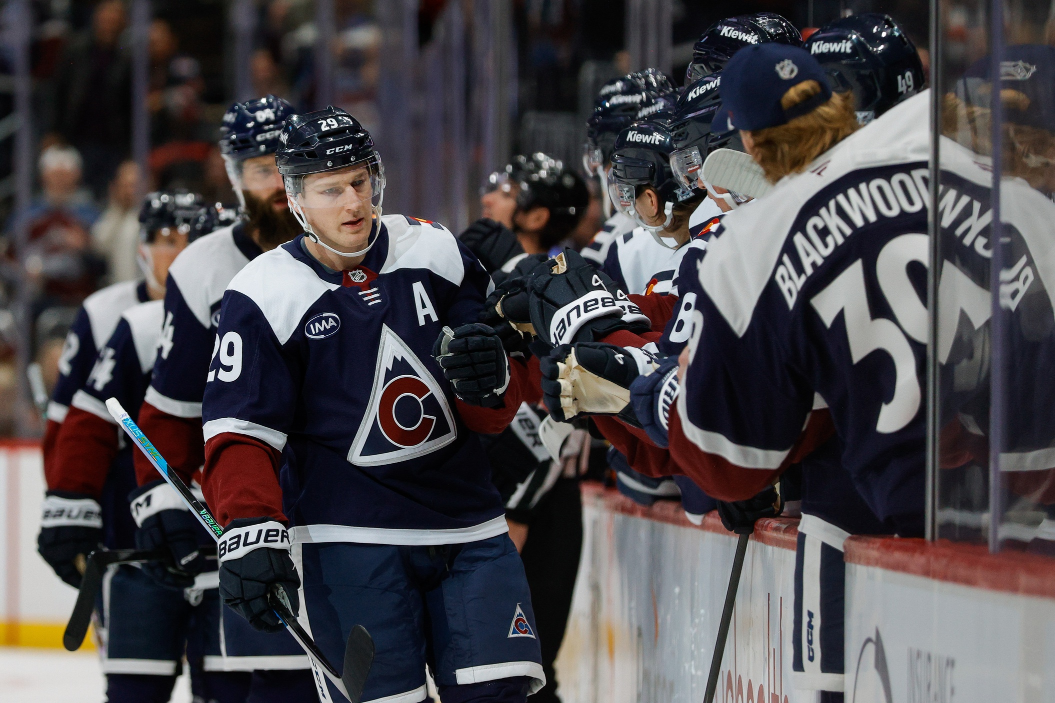 Nathan MacKinnon celebrates with the bench after his goal as we offer our Avalanche vs. Kraken player props.