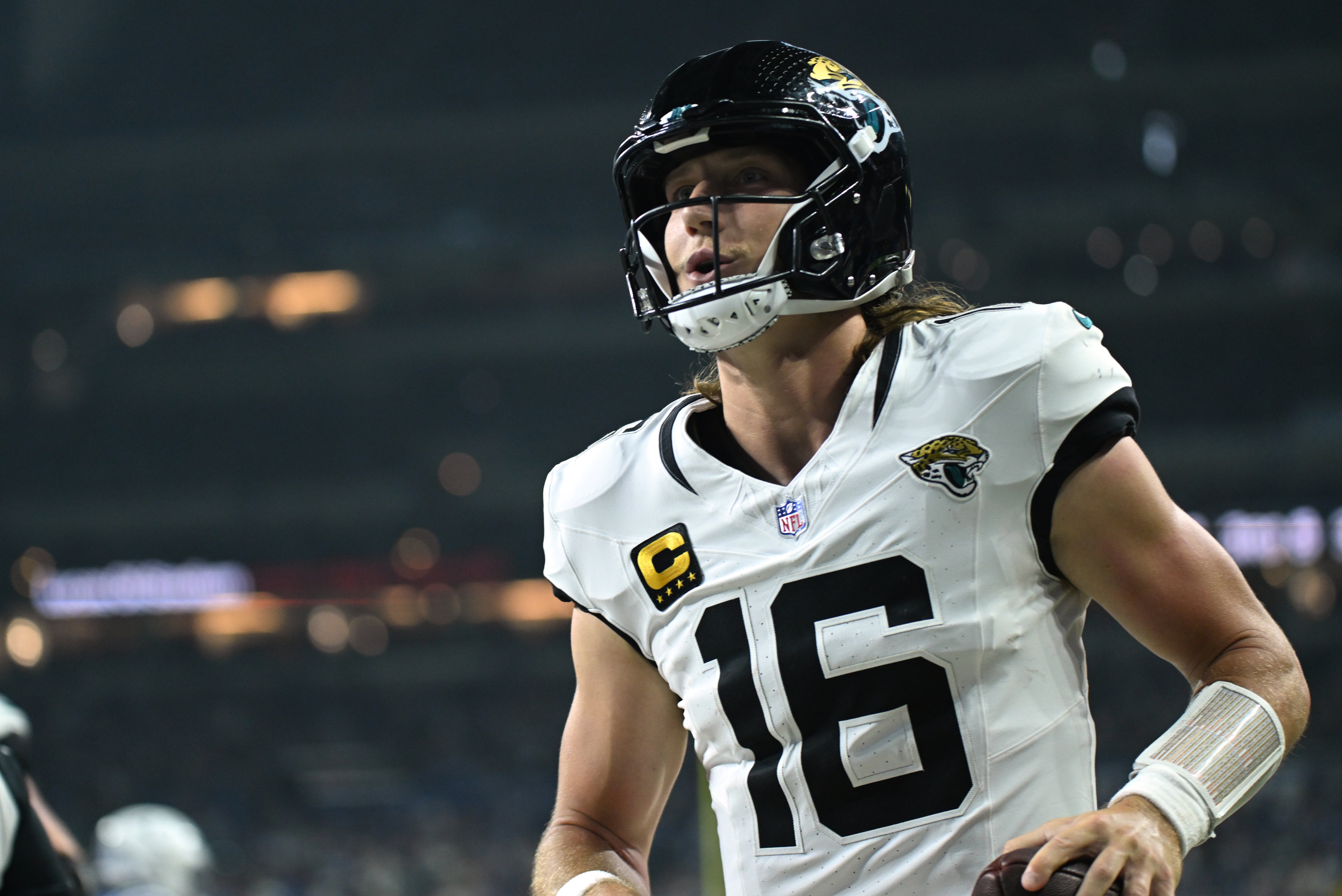 Jacksonville Jaguars quarterback Trevor Lawrence - who's featured in my NFL player props for Wild Card Weekend - celebrates after a touchdown.