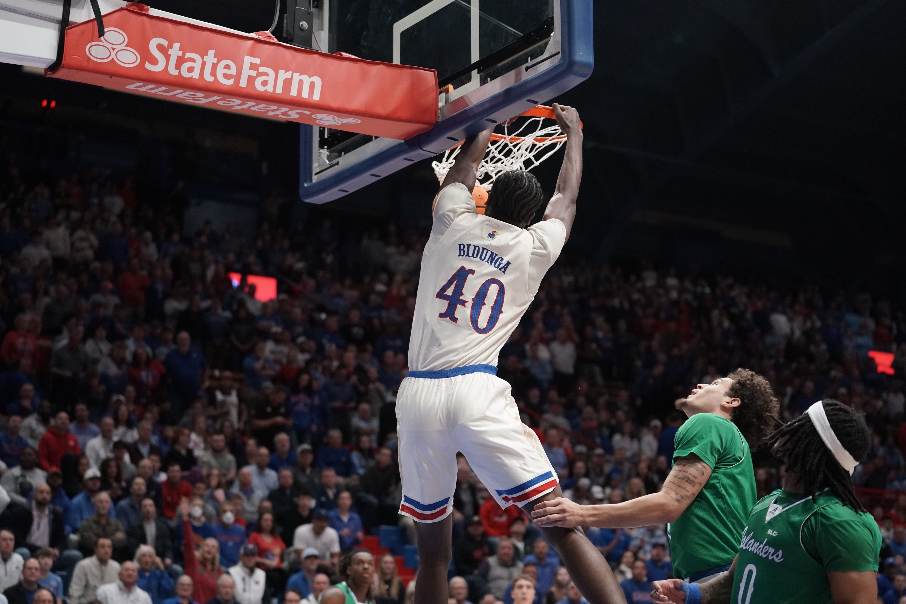 Kansas Jayhawks forward Flory Bidunga (40) dunks the ball as part of our Kansas vs. Duke prediction & odds