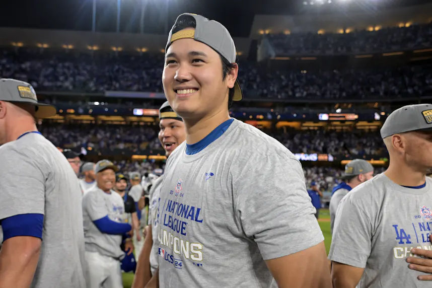 Los Angeles Dodgers designated hitter Shohei Ohtani celebrates on the field after defeating the New York Mets to advance to the World Series, and we explore all of the Shohei Ohtani home run odds ahead of Game 1.