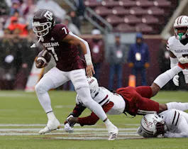 Moose Muhammad III of the Texas A&M Aggies runs with the ball after a catch against the Massachusetts Minutemen. 