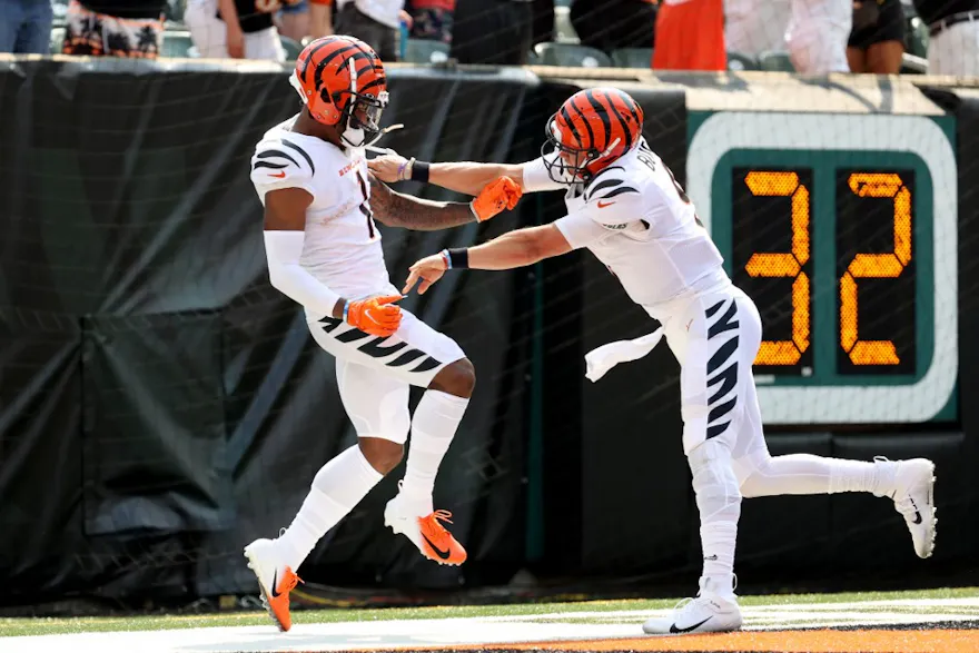 Ja'Marr Chase of the Cincinnati Bengals celebrates with Joe Burrow after a 50-yard touchdown reception during the second quarter against the Minnesota Vikings at Paul Brown Stadium. Andy Lyons/Getty Images via AFP. 