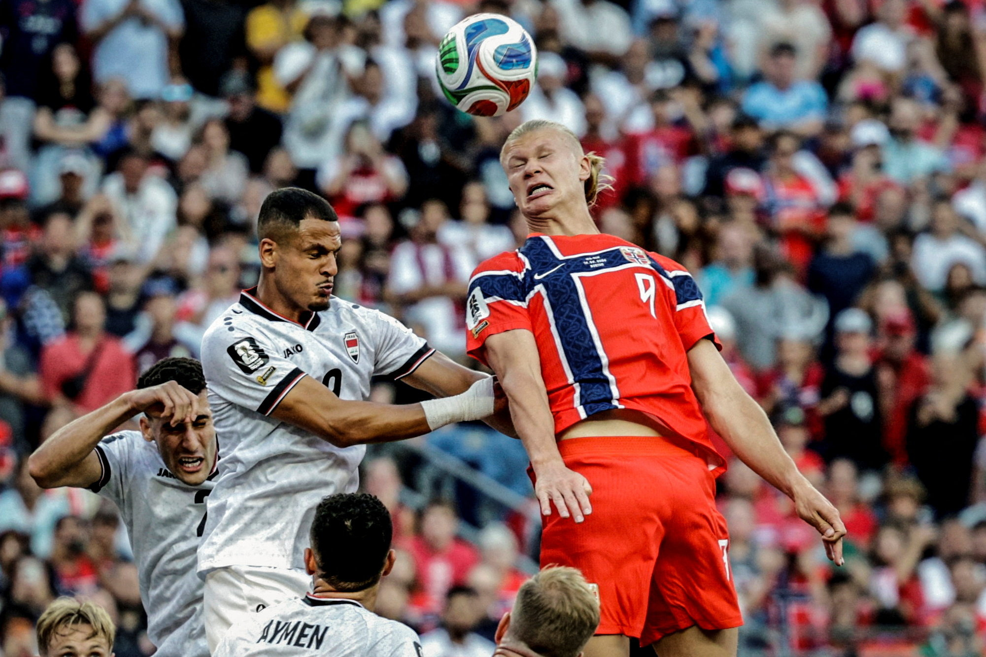 Erling Haaland - who's featured in our Haaland props - in action with Iraq's Ali Al Hamadi. 