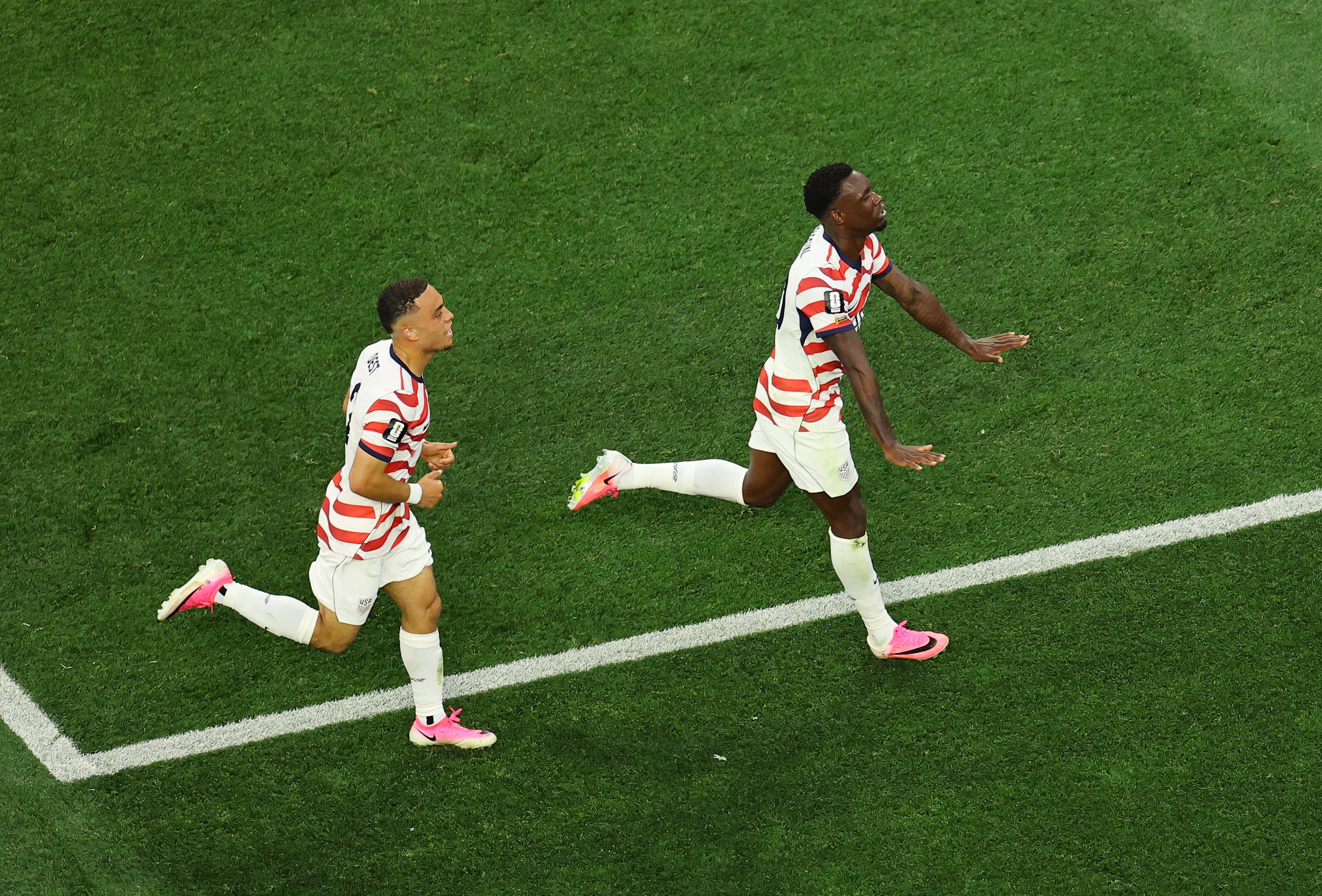 Folarin Balogun of the U.S. celebrates scoring their third goal as we break down our United States vs. Australia prediction.