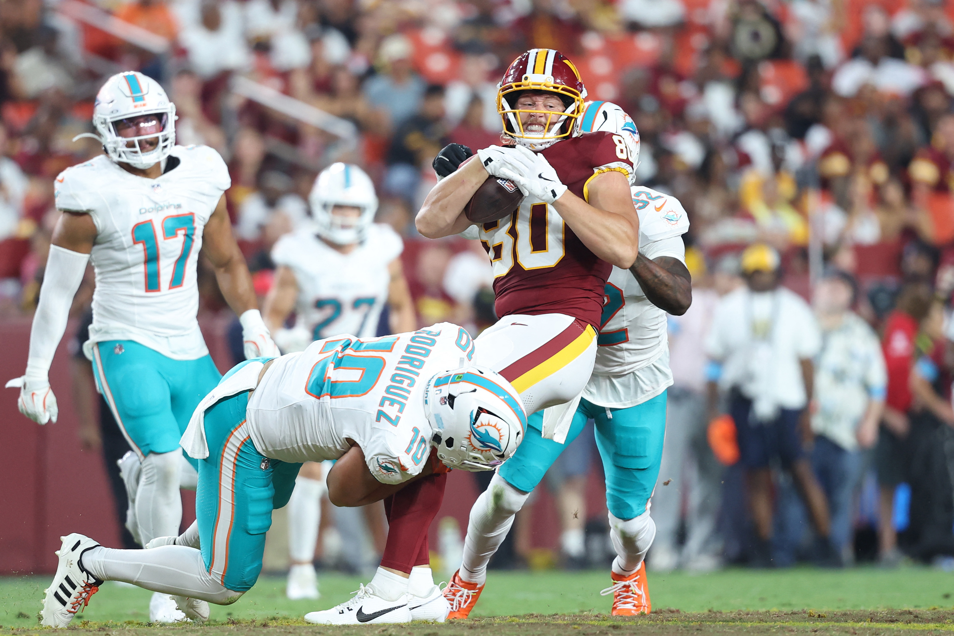 Miami Dolphins linebacker Jacob Rodriguez (10) and Dolphins safety Lonnie Johnson Jr. (32) defend during the first half at Northwest Stadium as we examine the 2026-2027 NFL Defensive Rookie of the Year odds.