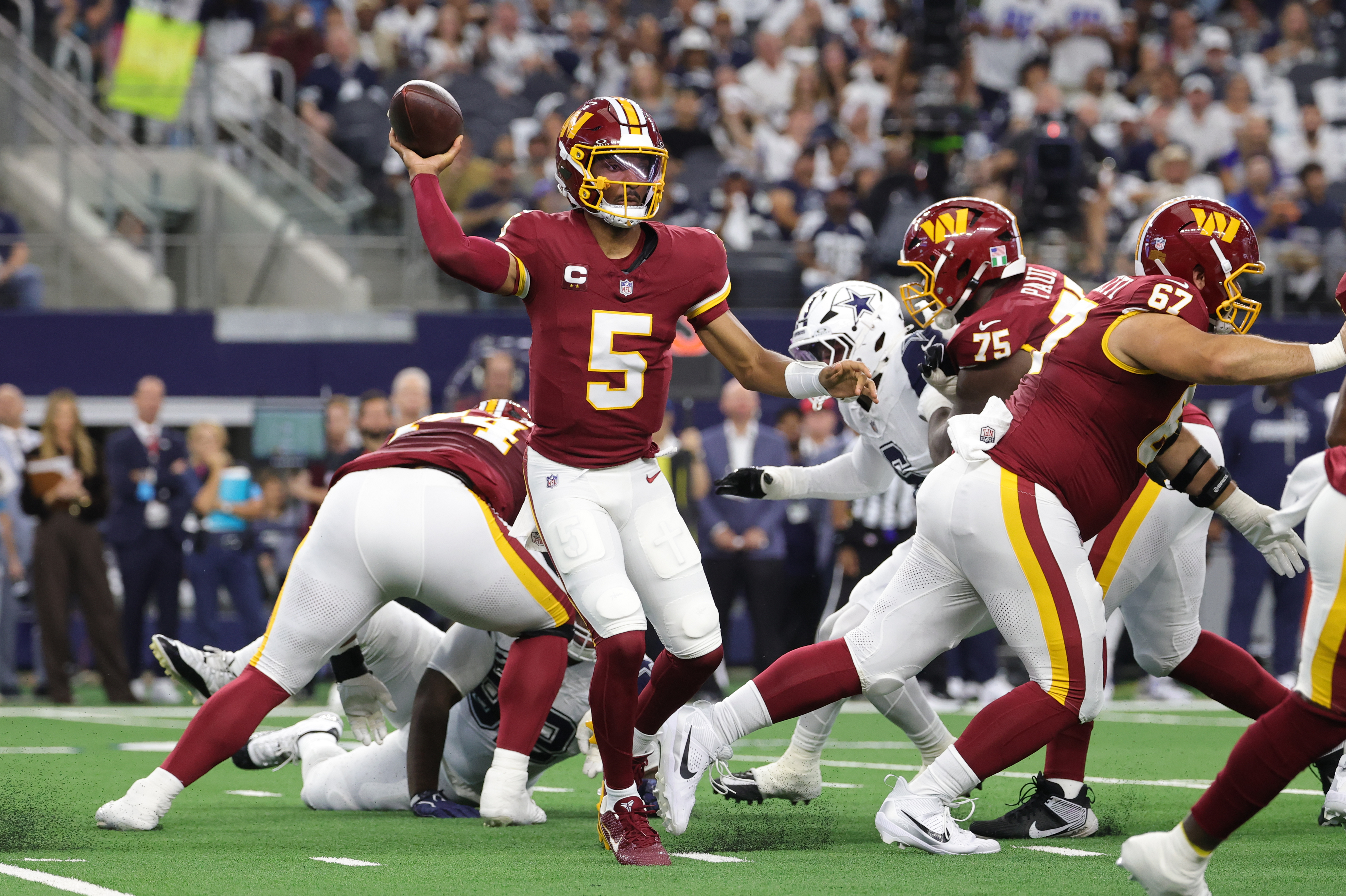 Washington Commanders quarterback Jayden Daniels attempts a pass as we make our best NFL Week 5 ATS picks.