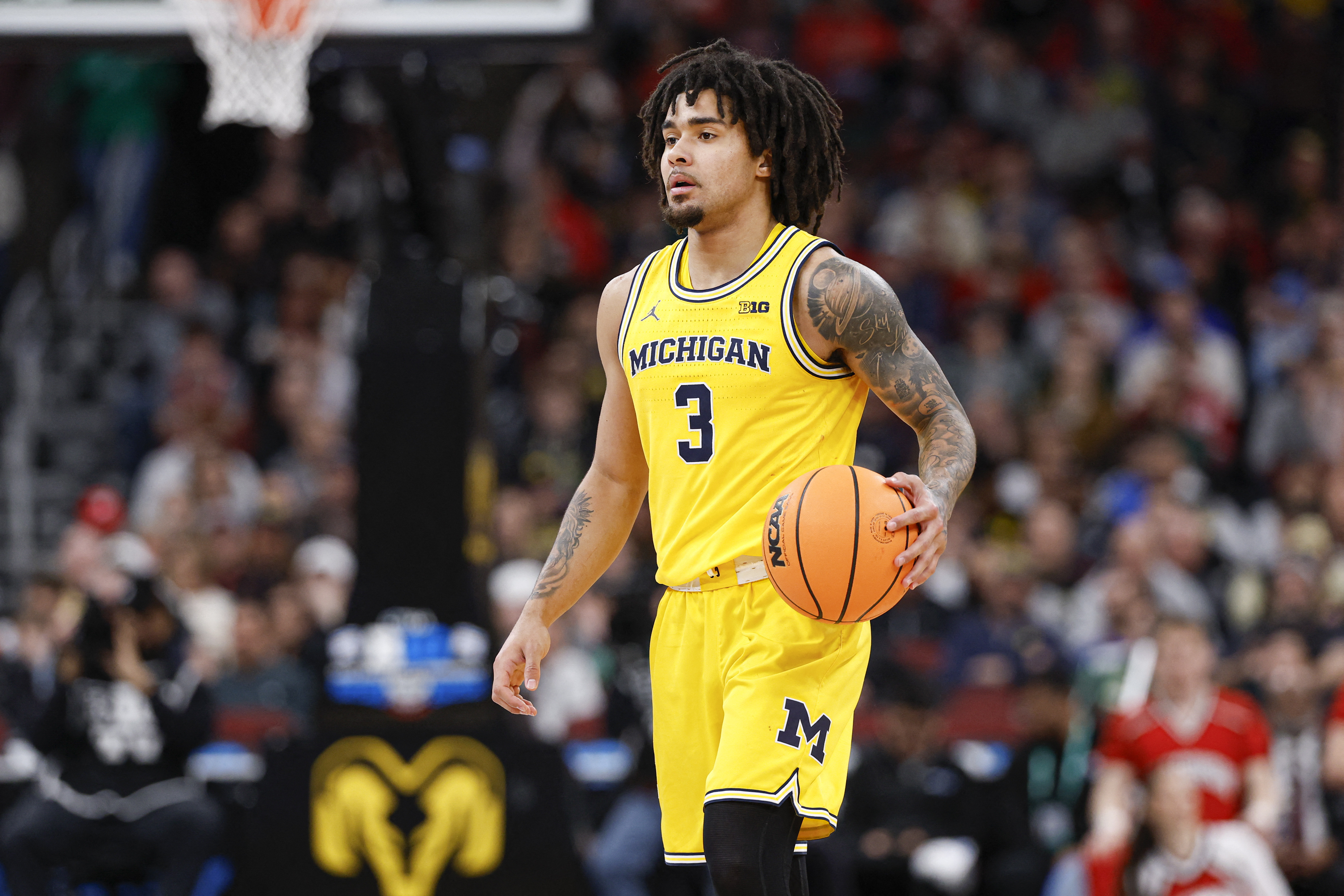 Michigan Wolverines guard Elliot Cadeau (3), seen here bringing the ball up the court, is featured in our Alabama vs. Michigan prediction.
