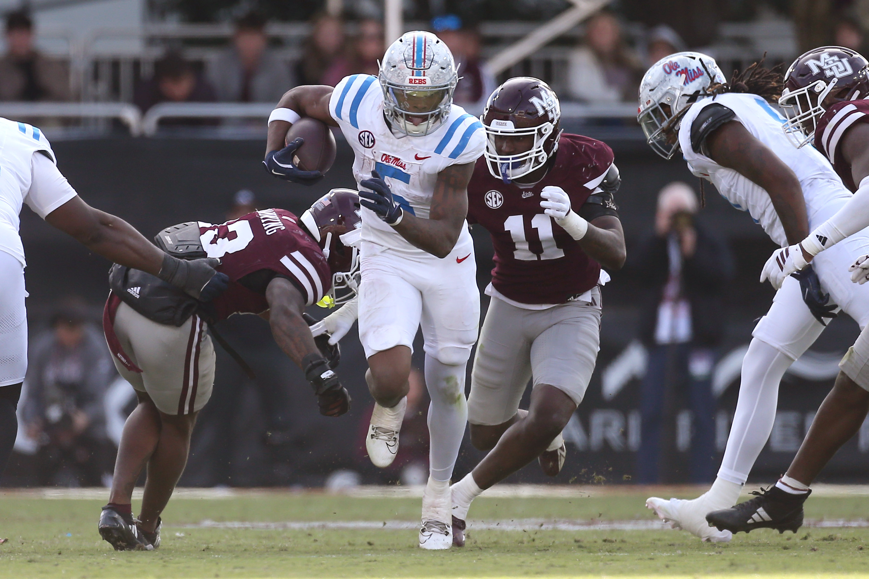 Ole Miss running back Kewan Lacy (5) runs up the field as we look at our college football predictions