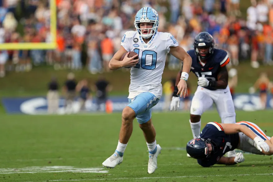 Drake Maye of the North Carolina Tar Heels rushes in the second half against the Virginia Cavaliers. 