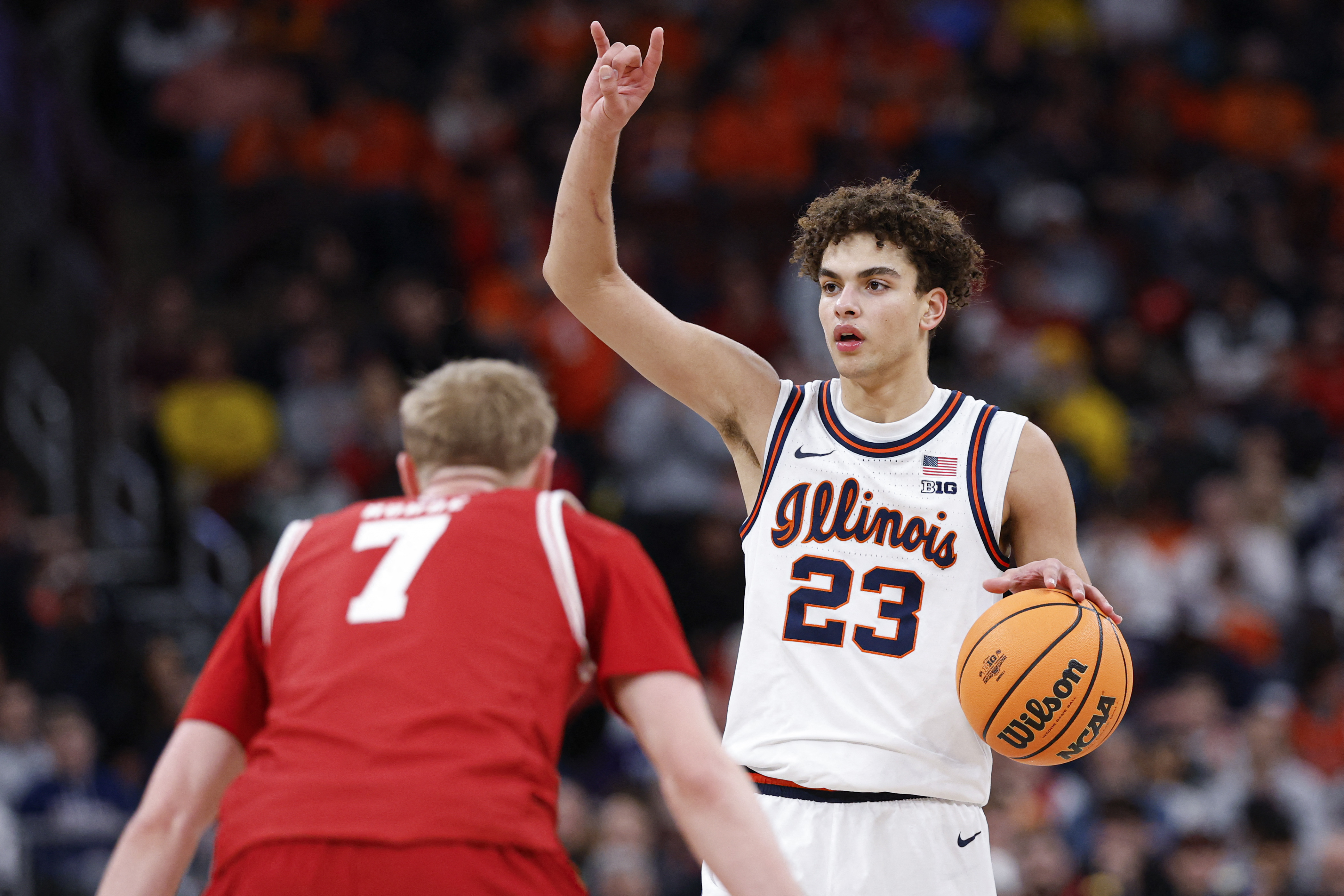 Illinois Fighting Illini guard Keaton Wagler brings the ball up court as we make our best bets and predictions for March Madness. 