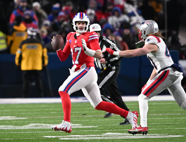 Buffalo Bills quarterback Josh Allen looks downfield to throw, as we examine the NFL MVP odds after Week 16.