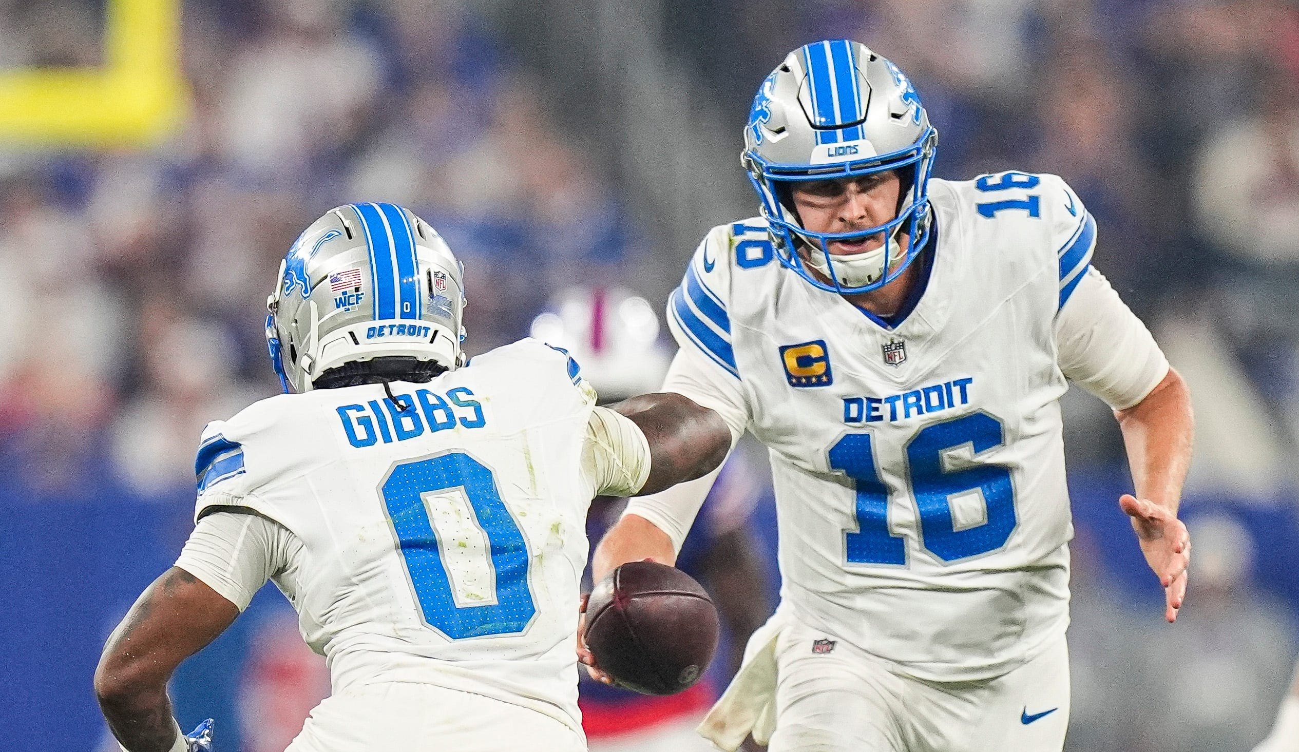 Jared Goff hands off the ball to running back Jahmyr Gibbs as we make our best Jets vs. Lions prediction