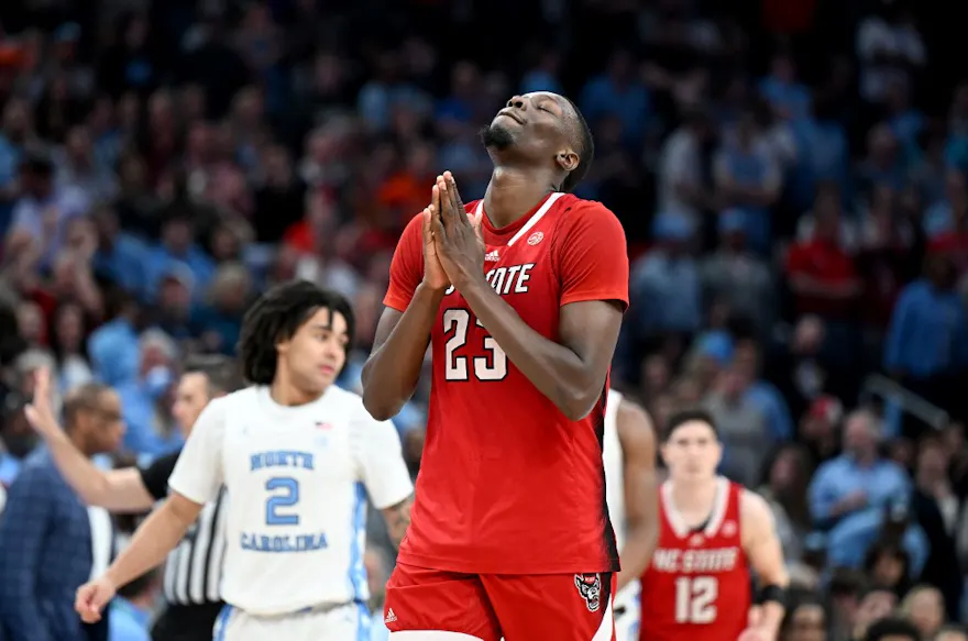 Mohamed Diarra #23 of the North Carolina State Wolfpack celebrates as we look at our Caesars North Carolina promo code