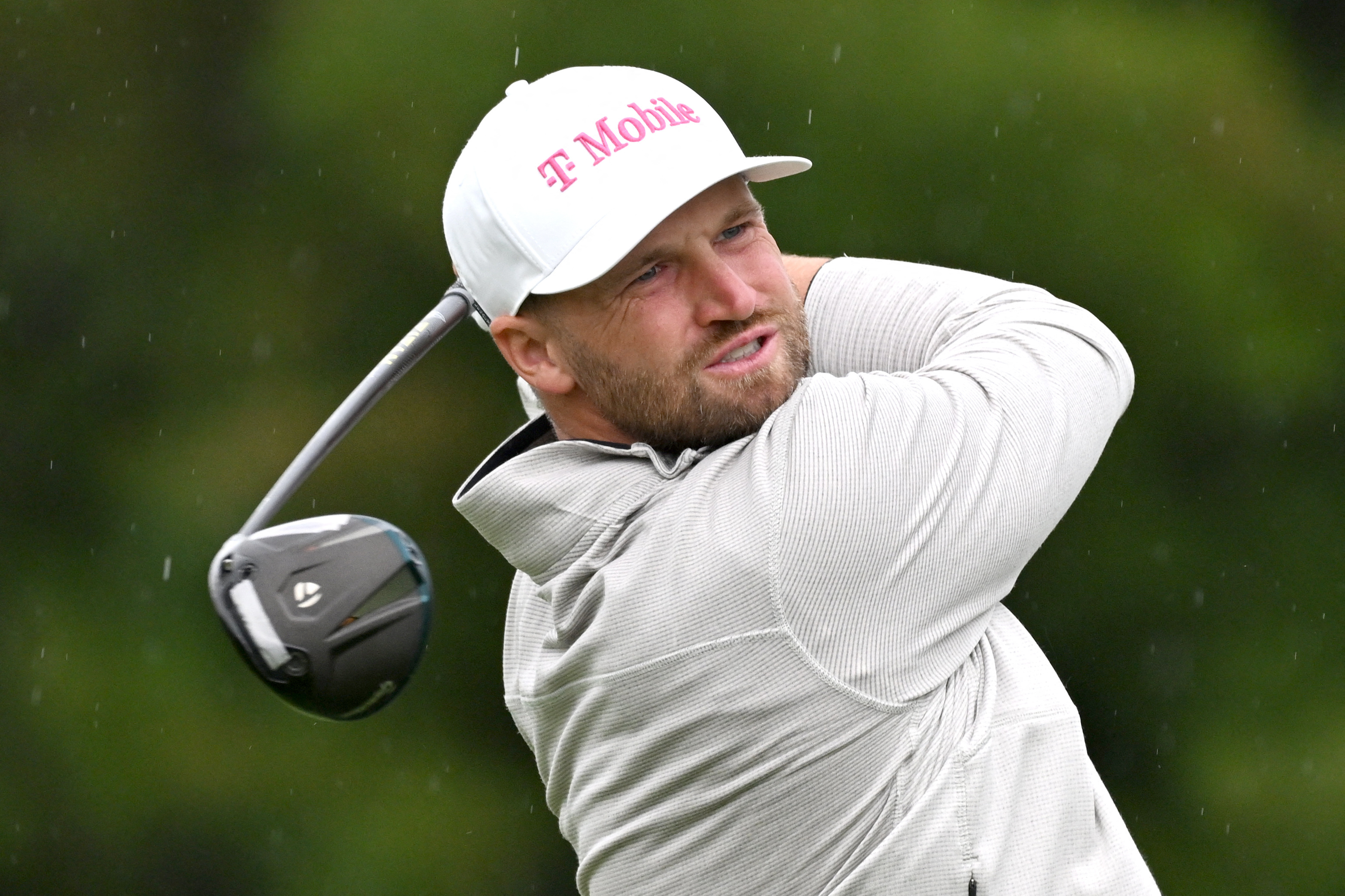Wyndham Clark hits his tee shot as he is featured in our U.S. Open long shots & sleeper picks.