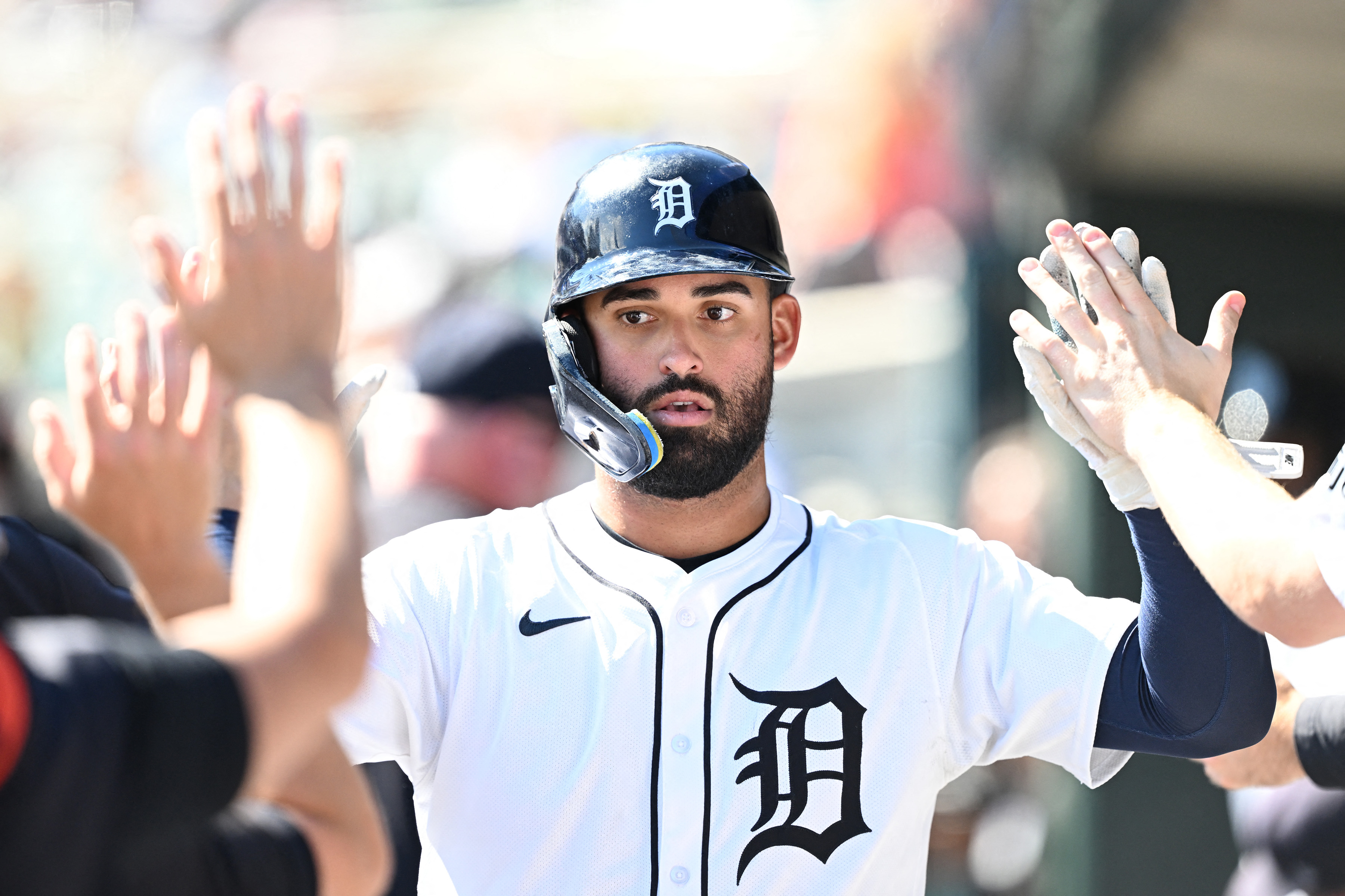 Detroit Tigers left fielder Riley Greene celebrates in the dugout, and he's key as we look at the Tigers vs. Twins win probability.