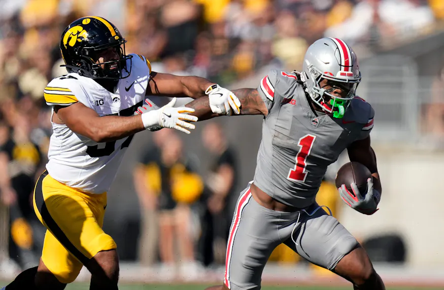 Ohio State running back Quinshon Judkins gets past Iowa linebacker Kyler Fisher. We're focusing on Judkins as part of our Week 7 college football expert picks.