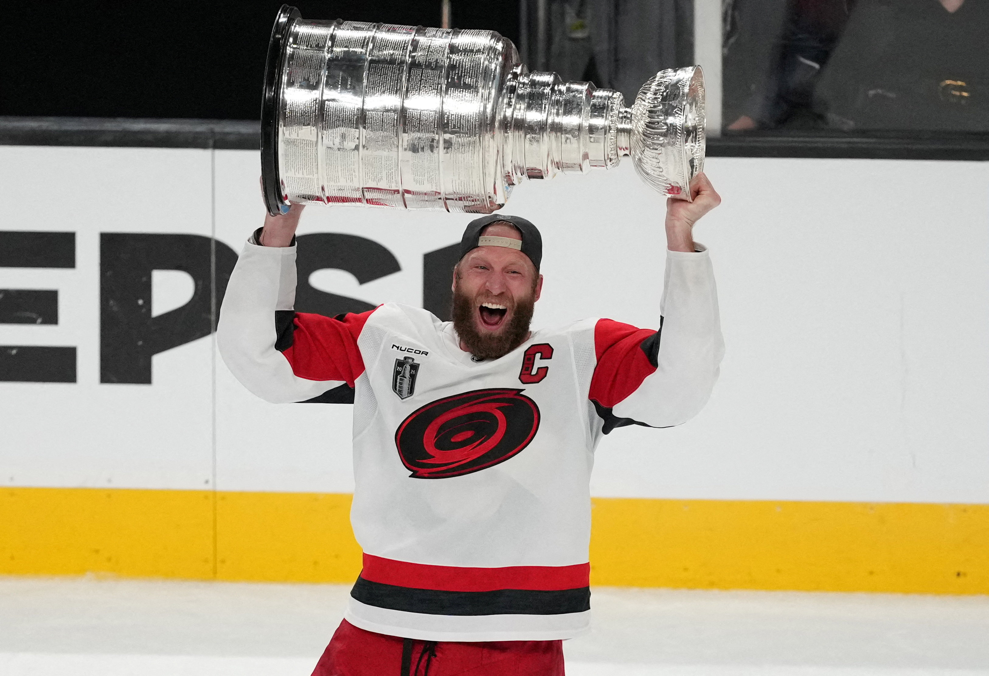 Carolina Hurricanes captain Jordan Staal (11) raises the Stanley Cup as we offer our Stanley Cup predictions for 2027.